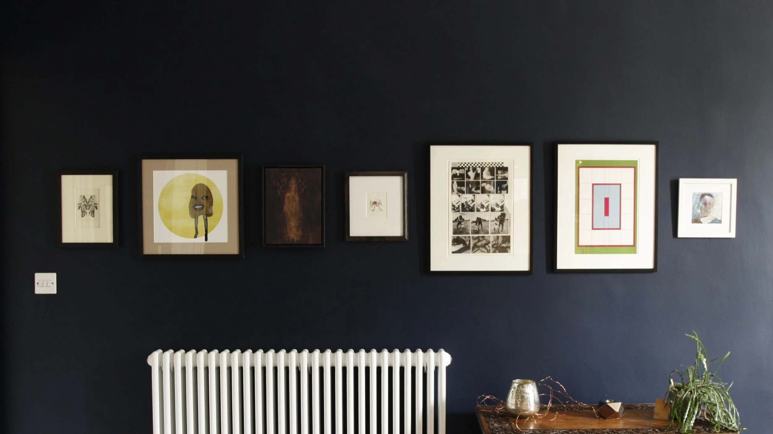 Gallery height picture hanging, Edinburgh. Collages, prints and drawings.