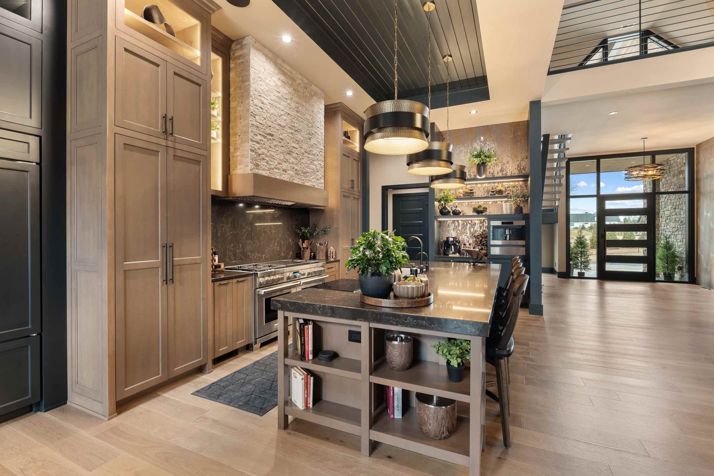 traditional custom home kitchen design with brown and dark granite
