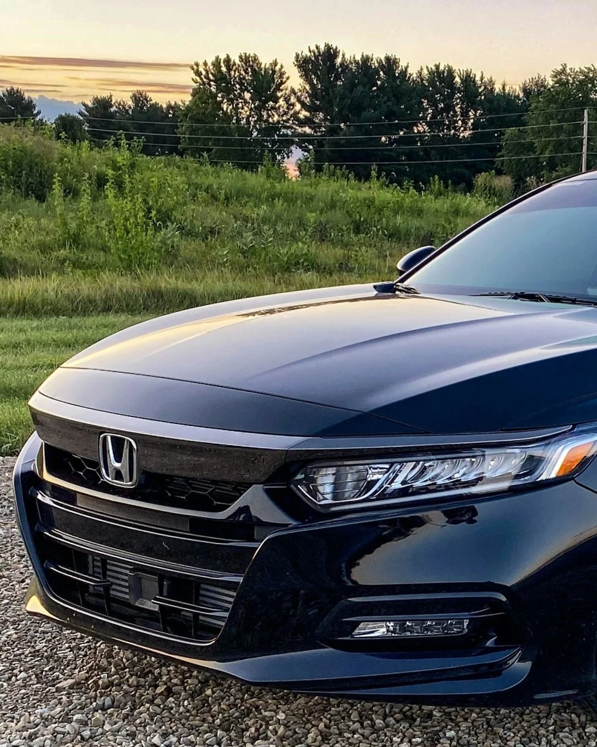 Close-up of the front of a black Honda car parked after receiving an exterior mobile detail in Hopkinsville, KY.