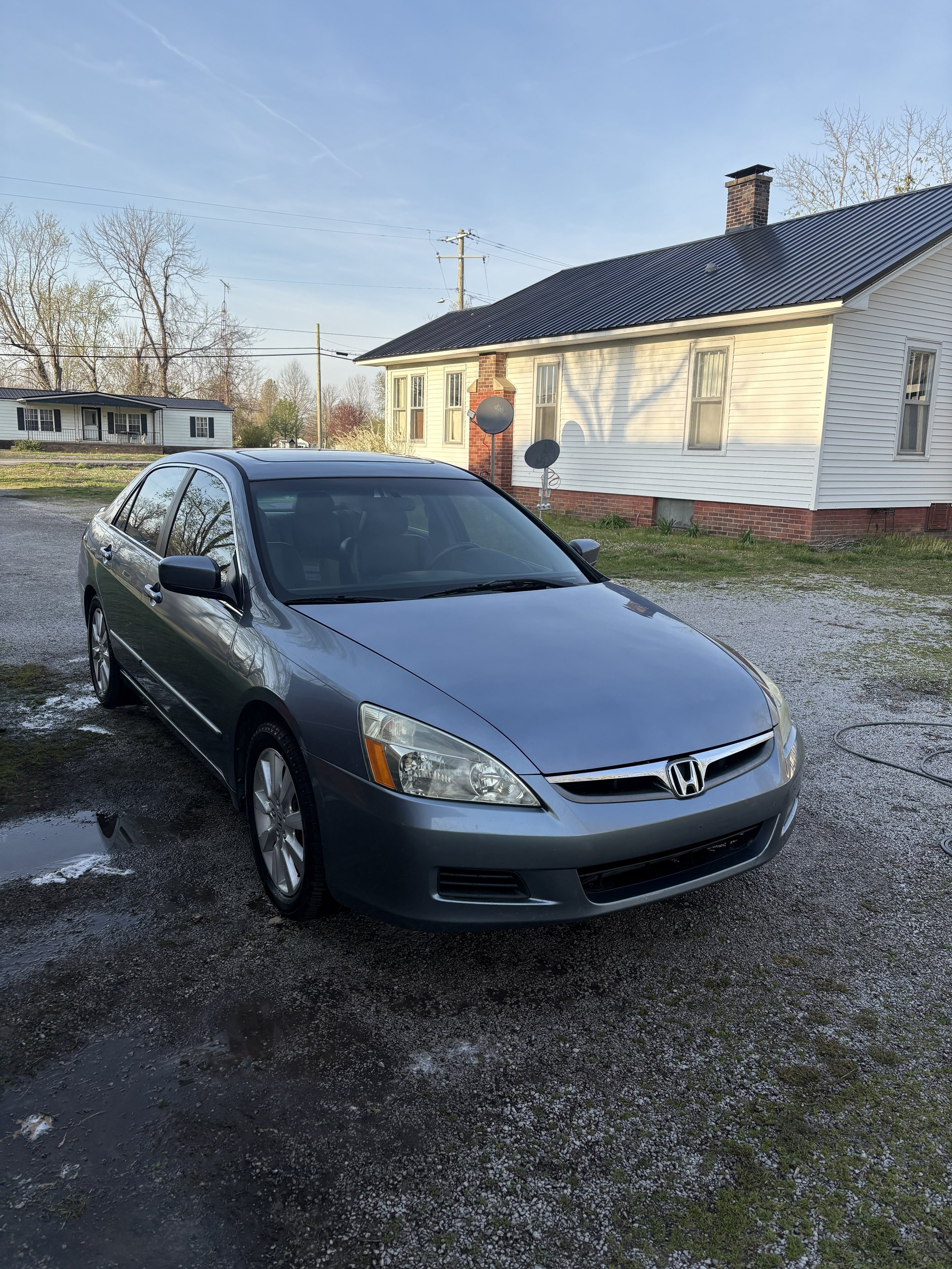 Gray Honda sedan sitting cleanly in driveway after Exterior Mobile Detail in Hopkinsvillle, KY.