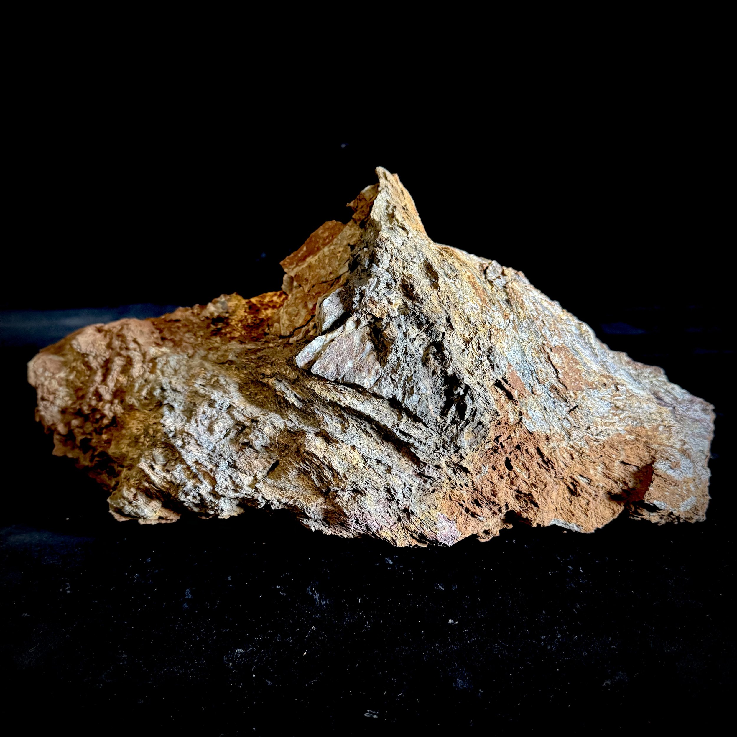 The Primordial Iron Island Monolith