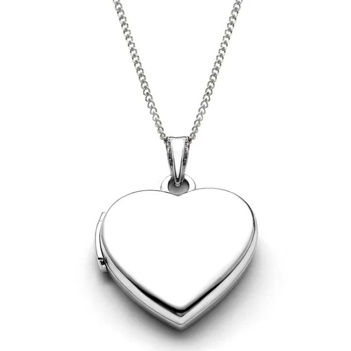 Sterling Silver heart locket, mid-size. Plain high mirror polish, substantial form, two photo capacity. 20mm