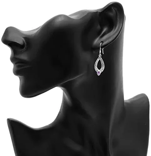 Sterling Silver Celtic Knotwork Navette Drop Earrings, pear-cut amethyst bezel set, fish hook fitting, shown on modelling bust at ear giving scale