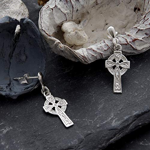 Sterling Silver Celtic Cross Drop Earrings, ringed crosshead, embossed knotwork shaft, oxidised finish, push back fitting, shown on Scottish slate with sea stone and dried botanicals