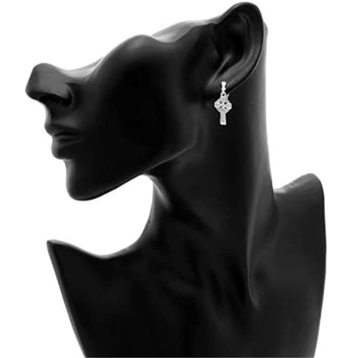 Sterling Silver Celtic Cross Drop Earrings, ringed crosshead, embossed knotwork shaft, oxidised finish, push back fitting, shown on modelling bust at ear.