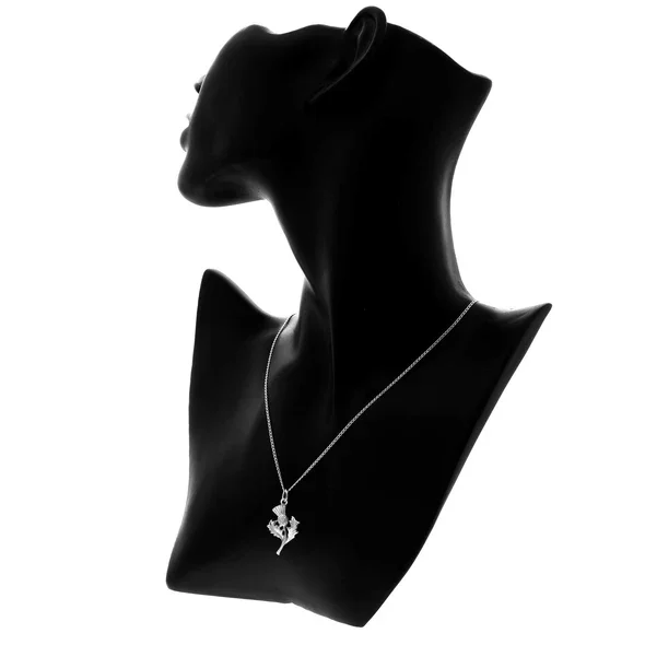 Sterling Silver Scottish Thistle Pendant, feathered head, crosshatched globe, naturalistic leaf detail, shown on modelling bust giving scale
