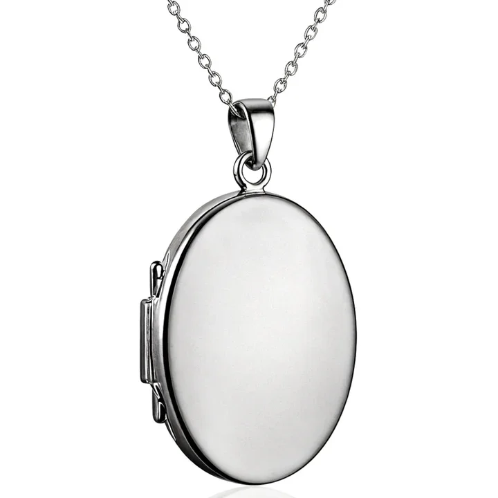 Sterling Silver oval photo locket. Plain high mirror polish, smooth curved edges, two photo capacity. 27mm.