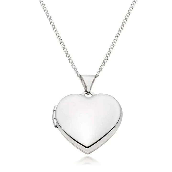 Sterling Silver petite heart locket. Plain high mirror polish, two photo capacity, simple bail. 16mm