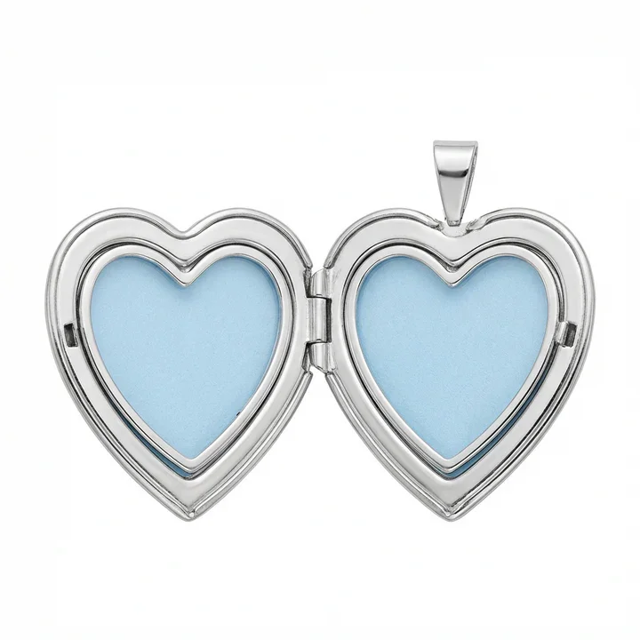 Sterling Silver heart locket with diamond. Star-set stone, satin and mirror polish contrast, showing internal photo clasps