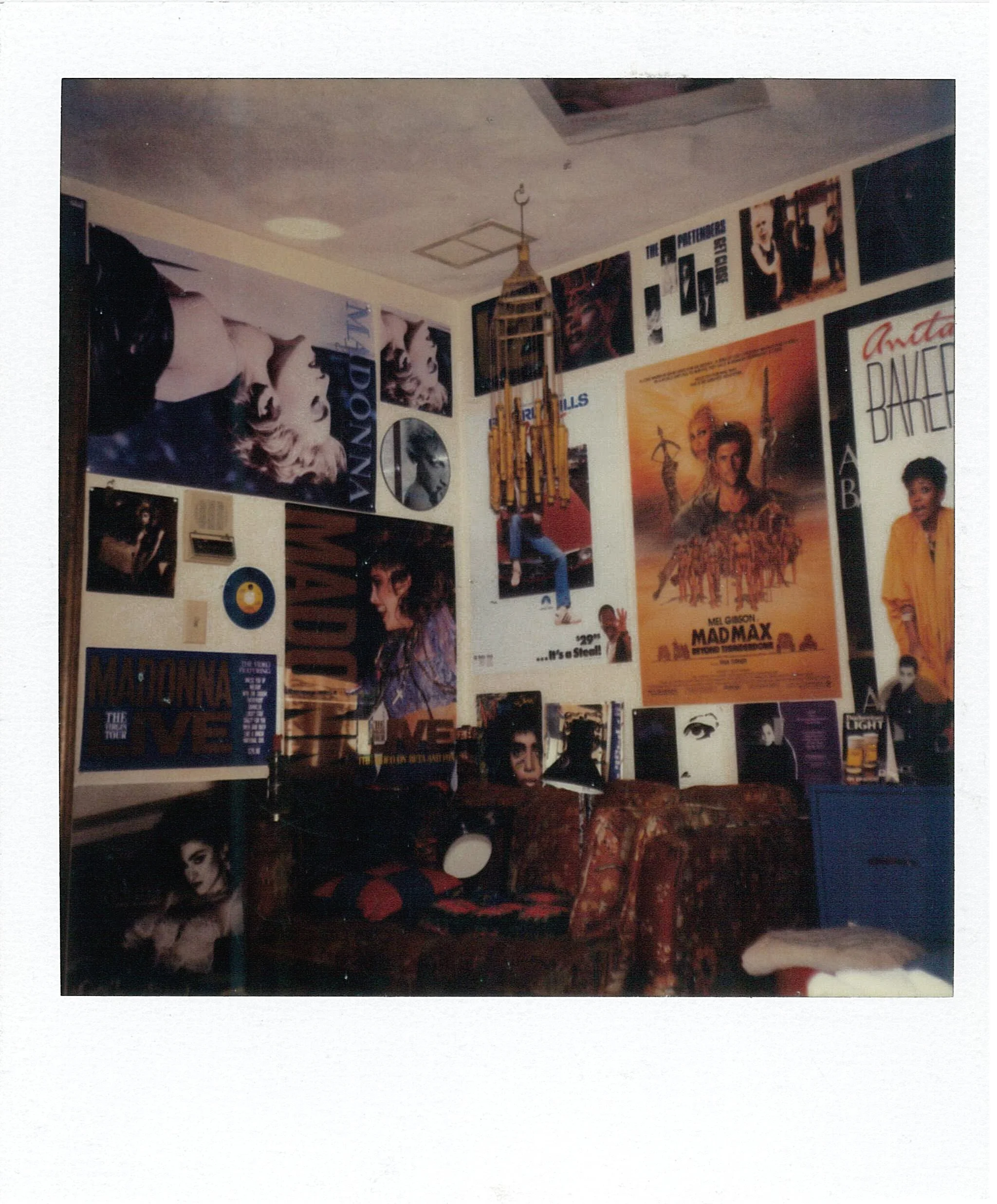 Bedroom covered with Madonna, Prince, and 1980s pop culture posters, reflecting the music-filled world explored in Joe O'Donnell’s memoir.