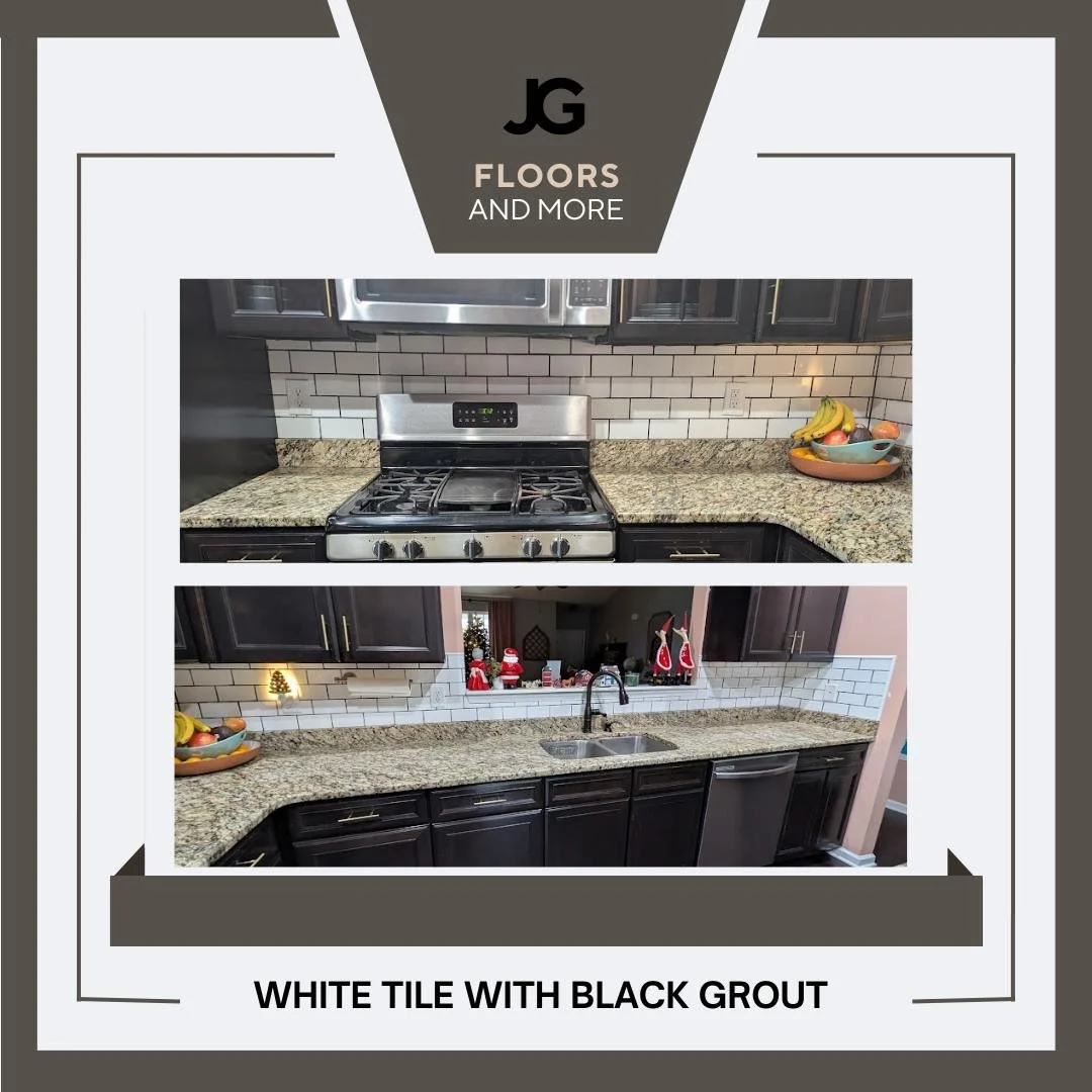 Interior kitchen with black cabinets, white tile backsplash with black grout, granite countertops, stainless steel appliances, and holiday decorations.