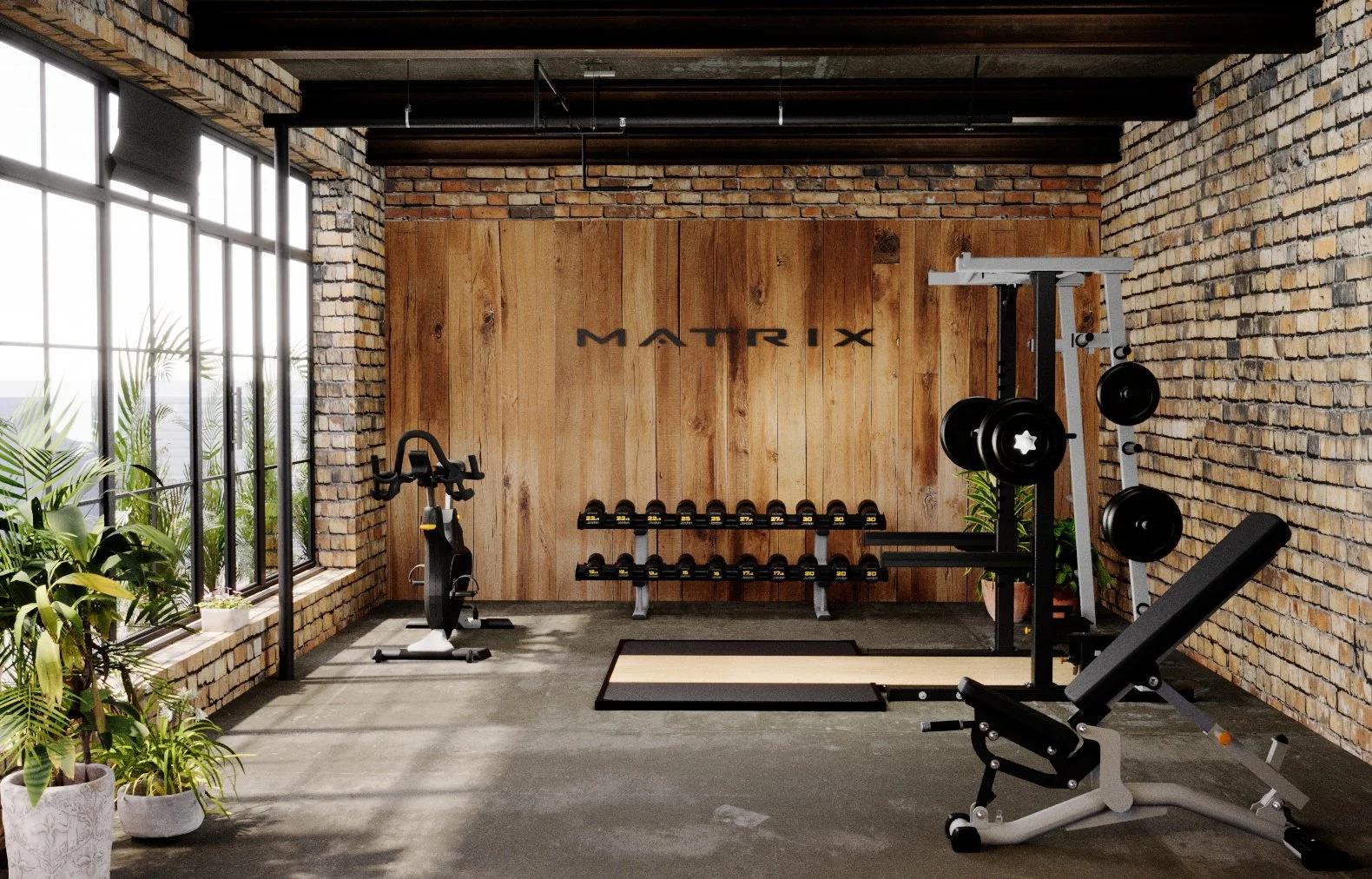 Fitnessraum mit Hanteln, Fahrrad, Gewichtsständer und Trainingsbank in einem Industrie-Design mit Backsteinwänden und großen Fenstern