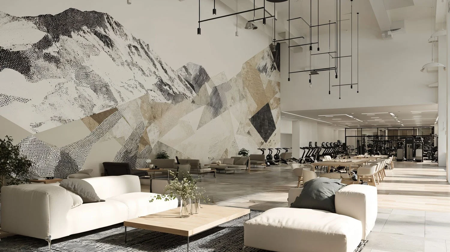 Großer, modern gestalteter Raum mit Sitzmöbeln, Fitnessgeräten und Wandkunst mit Bergen in hellen Farben.