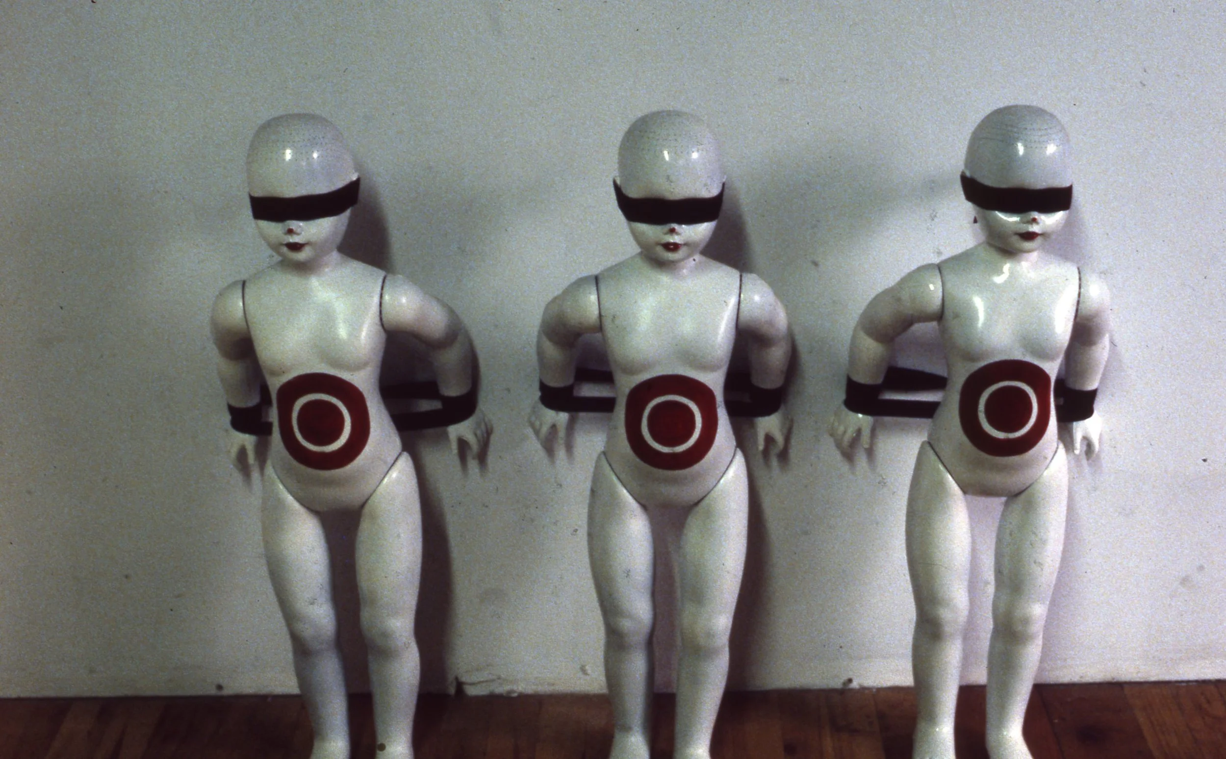 Enamel on Plastic Doll and Feathers 1979
