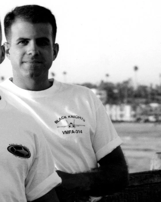 On the pier in Oceanside, California, with my condo in the background.