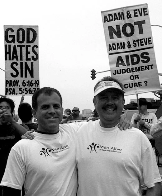 With my friend and fellow gay men's chorus member, Ty Rose, at the Orange County 2003  California AIDS Walk. Most of the walkers were heterosexual and seemed shocked that this level of homophobia still existed in the United States.