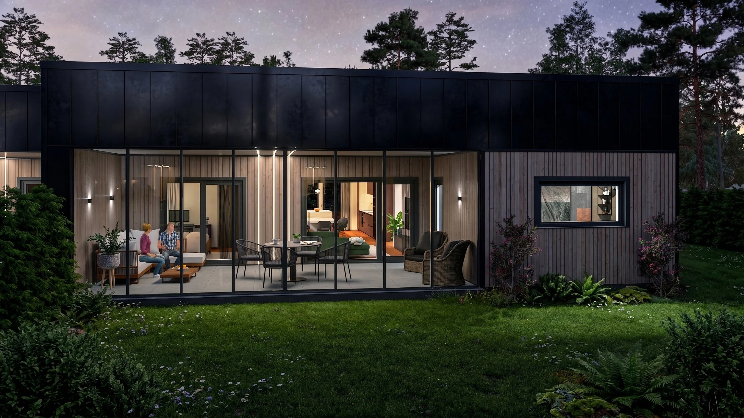 Modern house with large glass windows showing interior rooms, surrounded by greenery and tall trees, evening setting with outdoor seating area, two people sitting and chatting.