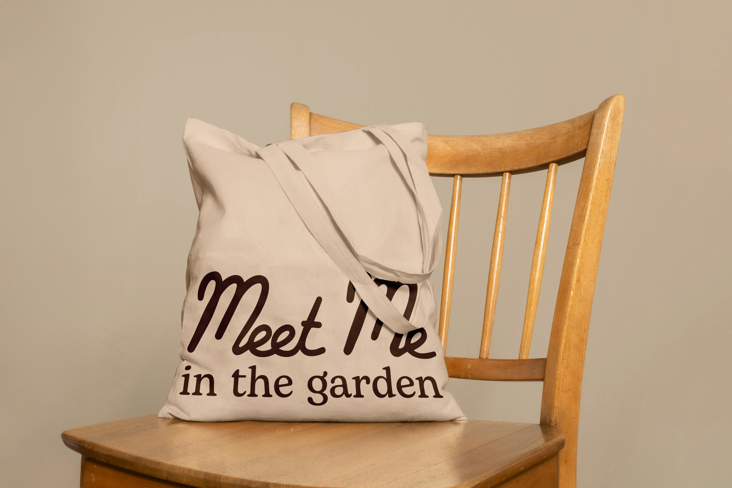 Free Canvas Bag on Chair Mockup.png