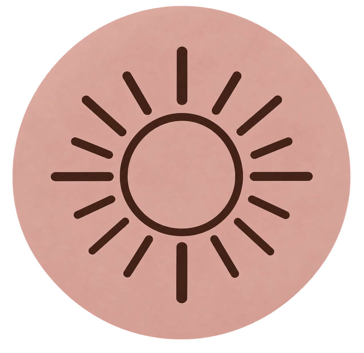 A pink circular object with a black sunburst pattern in the center.