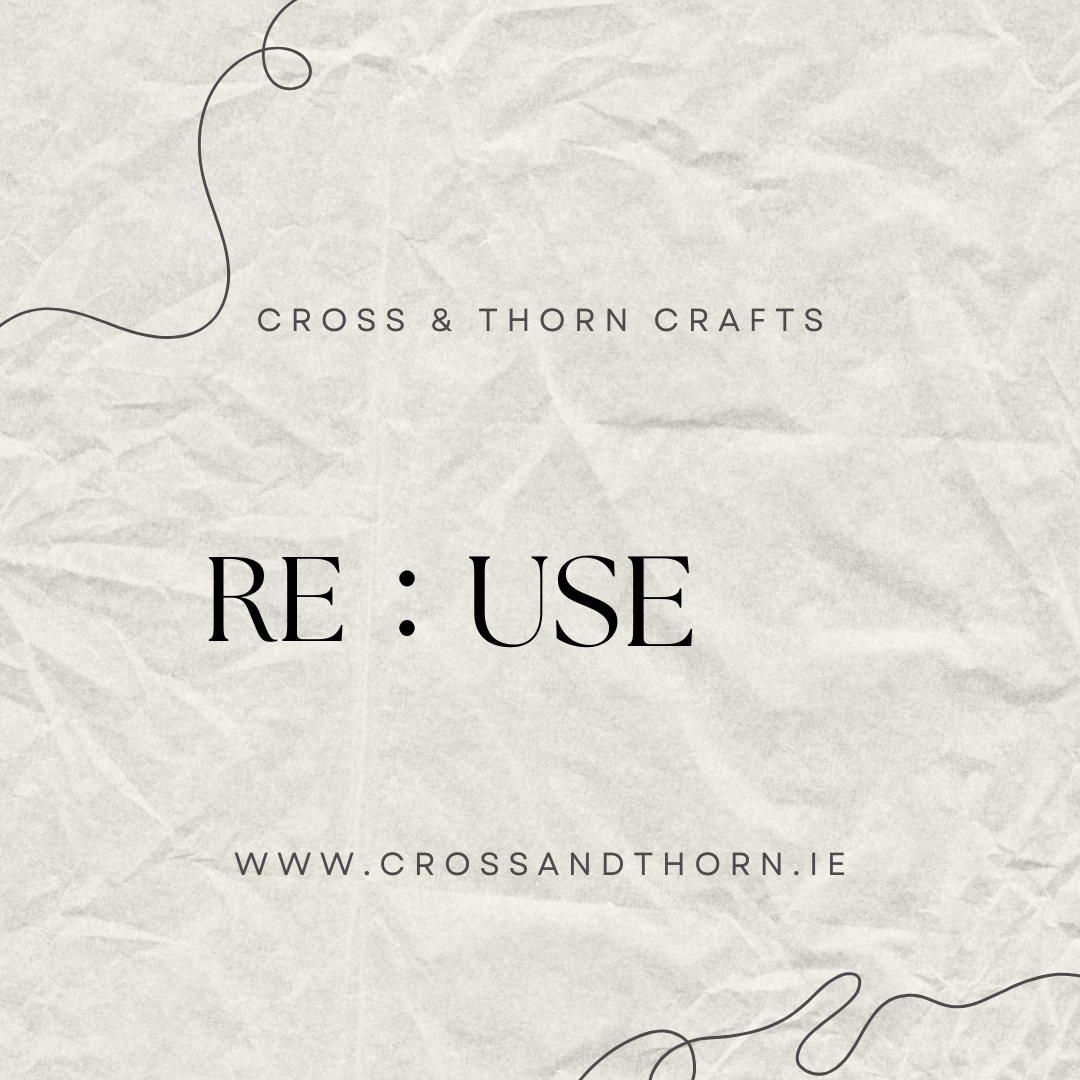 A craft business card for Cross & Thorn Crafts with text 'RE:USE' and the website www.crossandthorn.ie on a crumpled paper background.