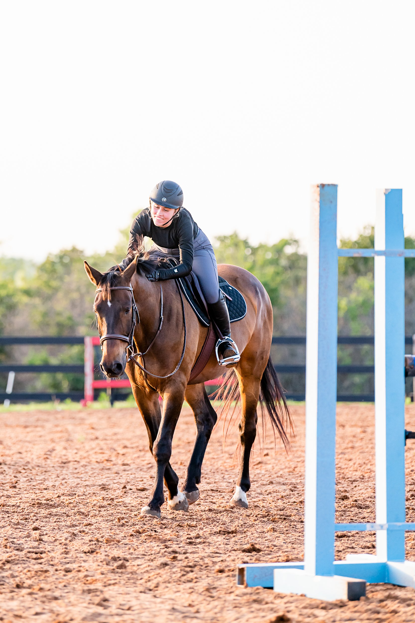 girl riding and training her own horse