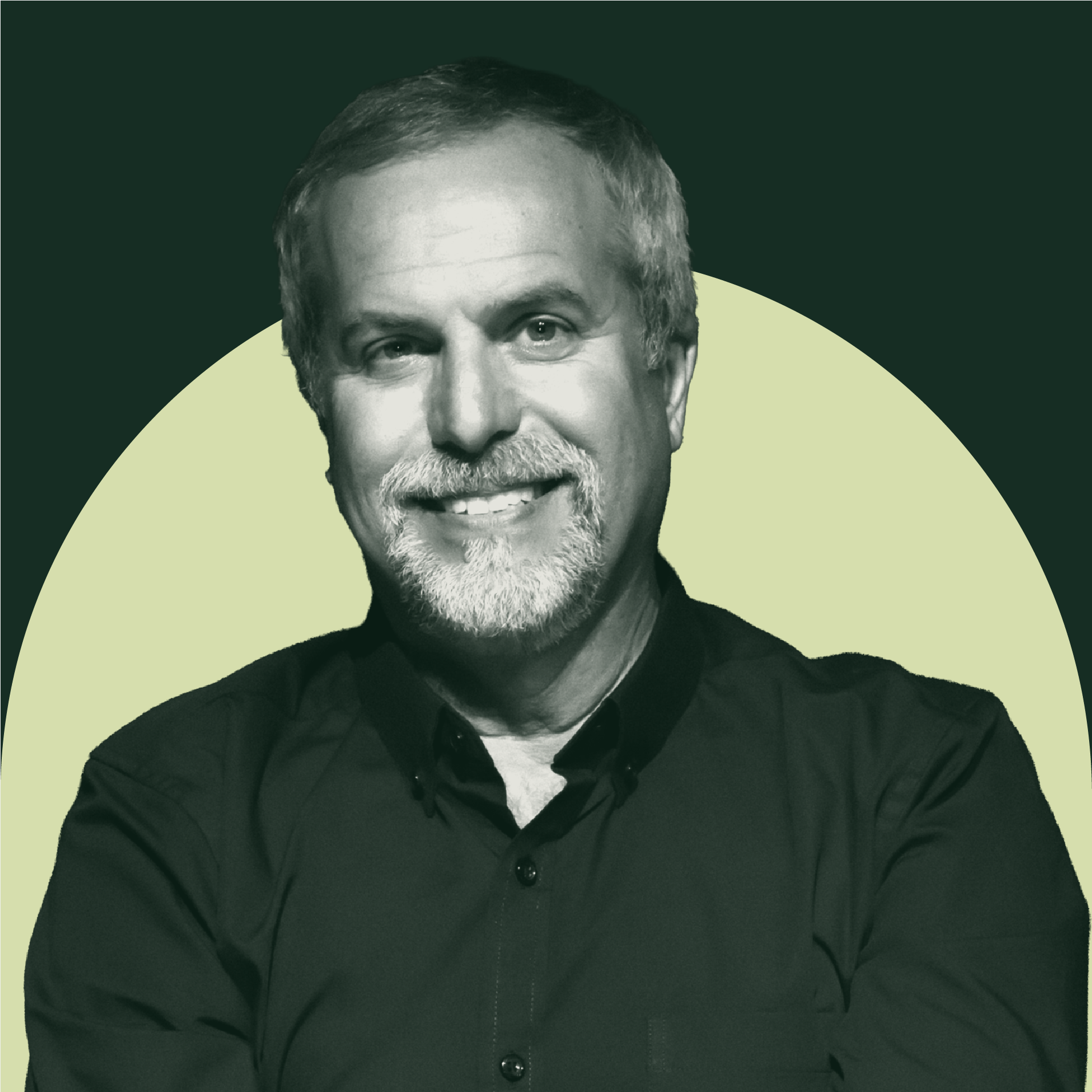 Portrait of a smiling middle-aged man with gray hair and beard, wearing a black button-up shirt, against an abstract background of pale yellow and dark green shapes.