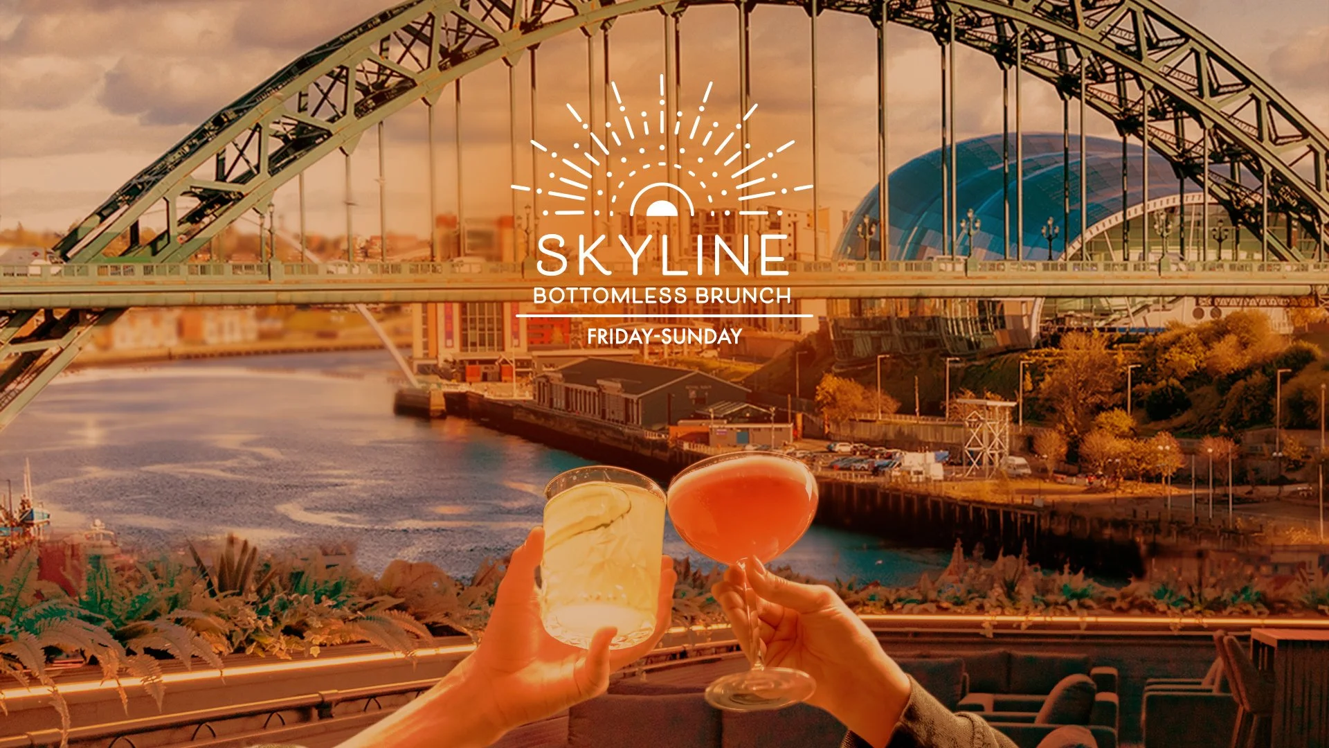 Two people holding drinks, one with a beer and the other with a pink cocktail, overlooking a cityscape with a bridge and a dome-shaped building during sunset, advertising Skyline Bottomless Brunch from Friday to Sunday.