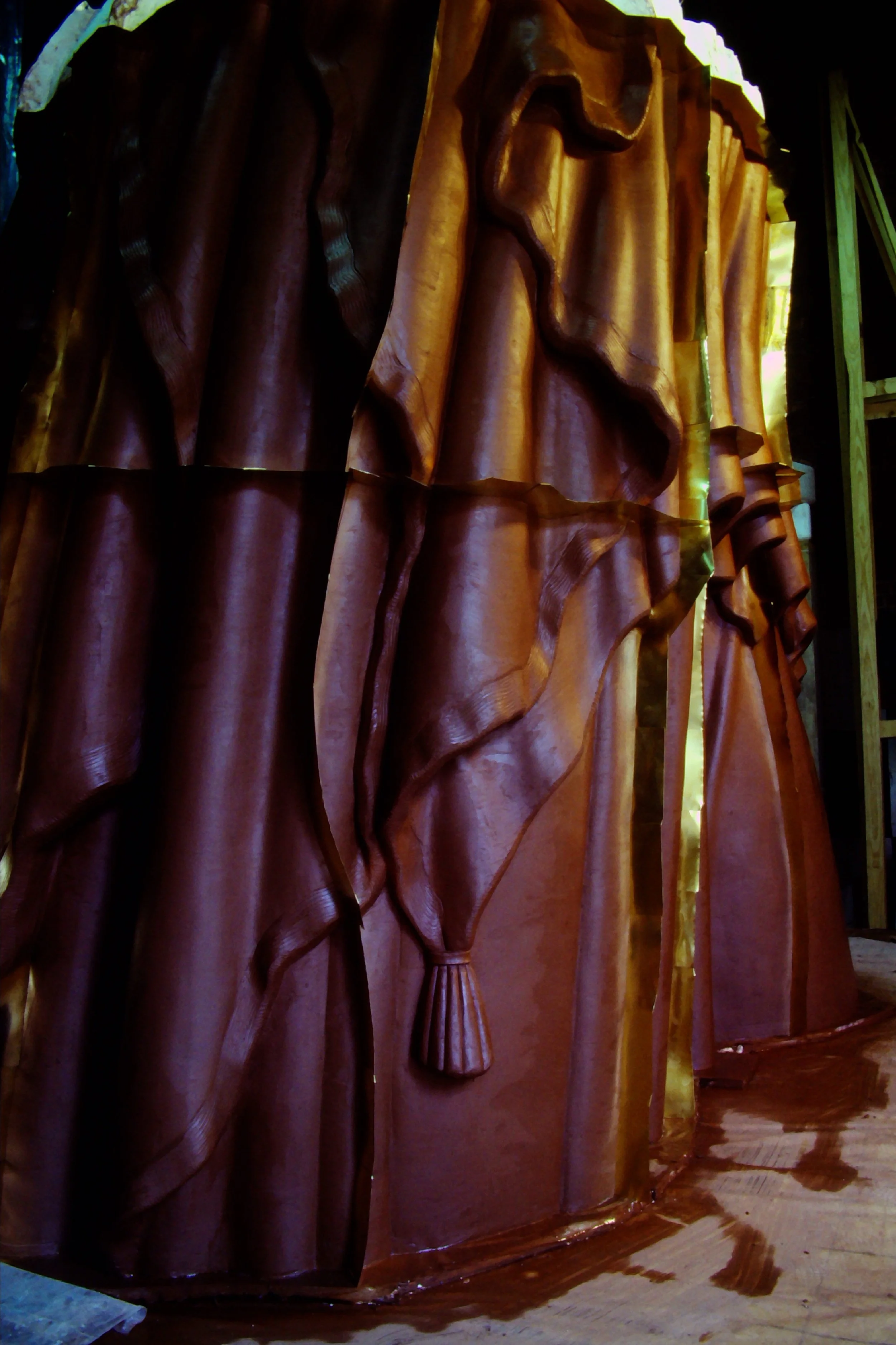 Clay sculpture of draped fabric patterns inside a workshop. Athena Parthenos in Parthenon Museum Nashville. 