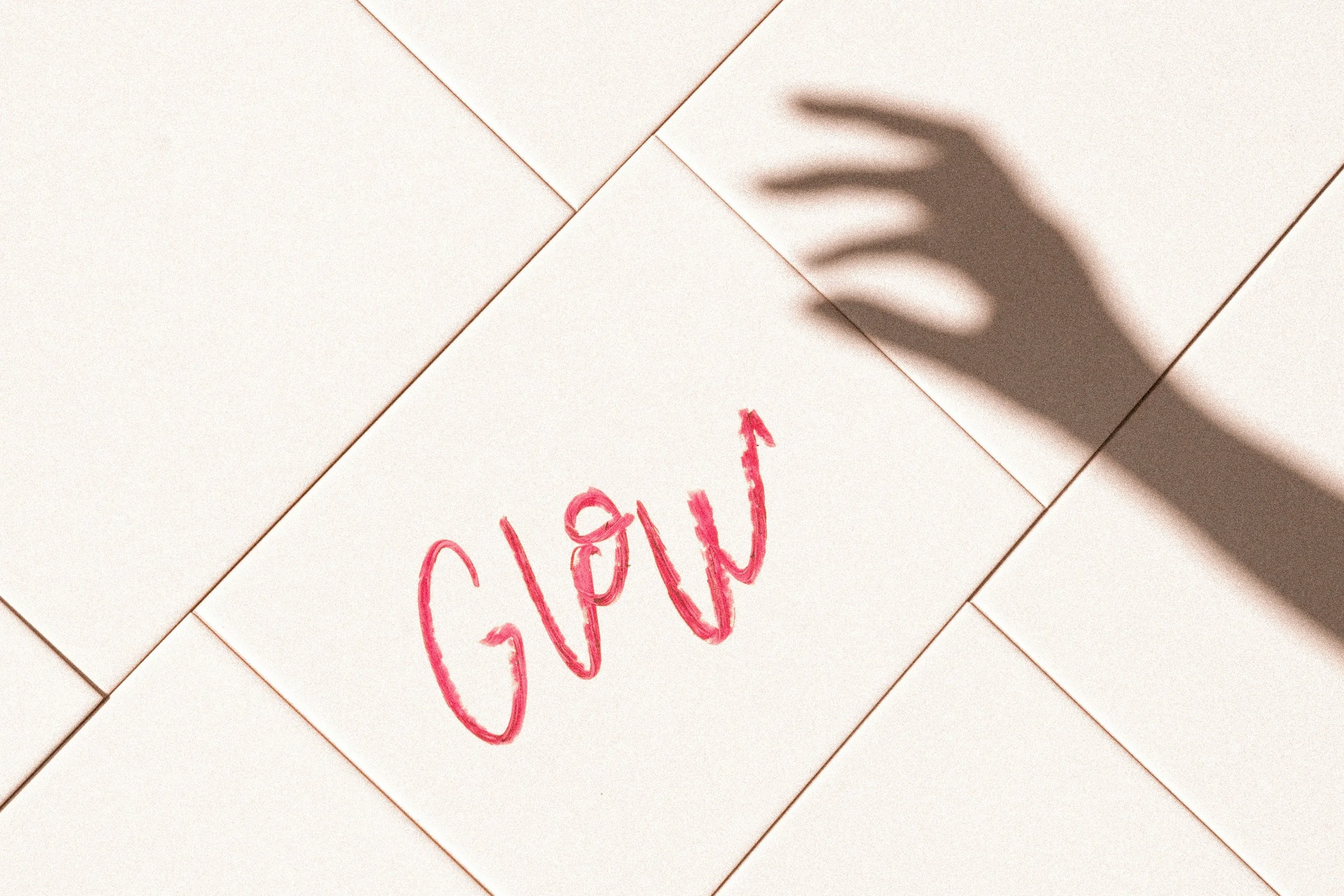 image that says "glow" in the center