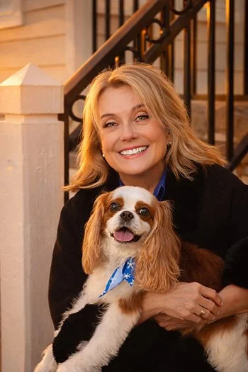 Adrienne Love and Rollo on steps