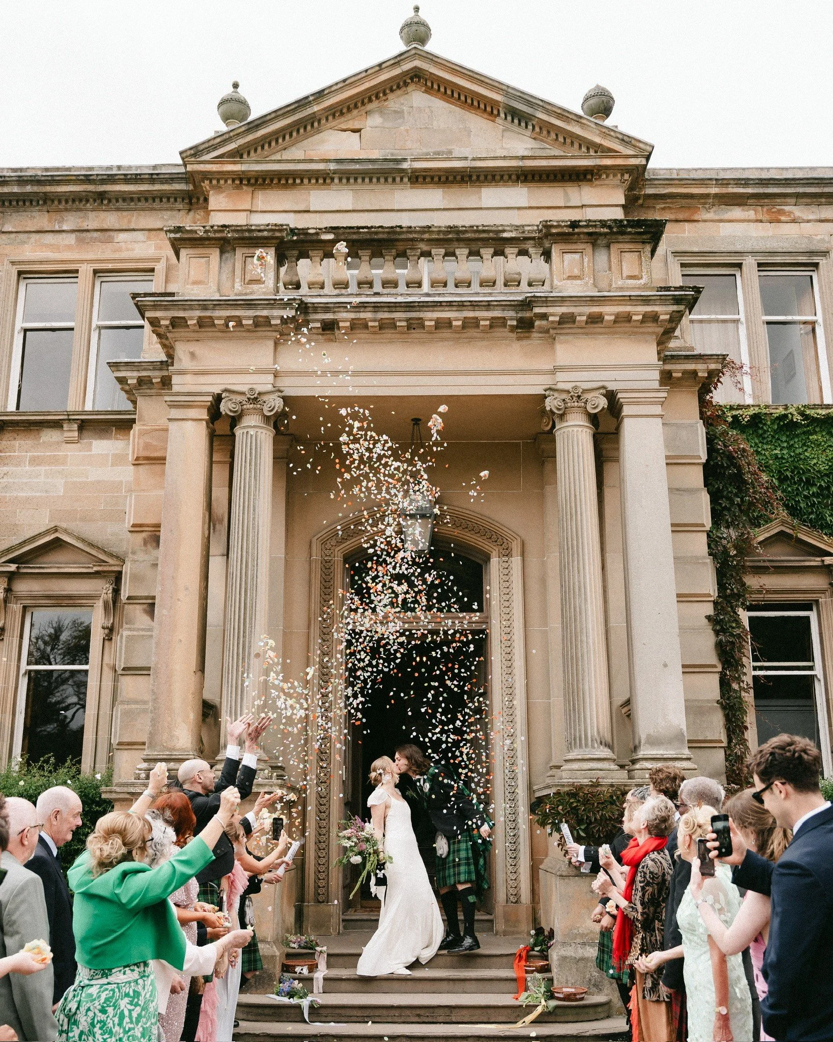 confetti shot outside wedding venue errol park in scotland partial planning on the day coordination