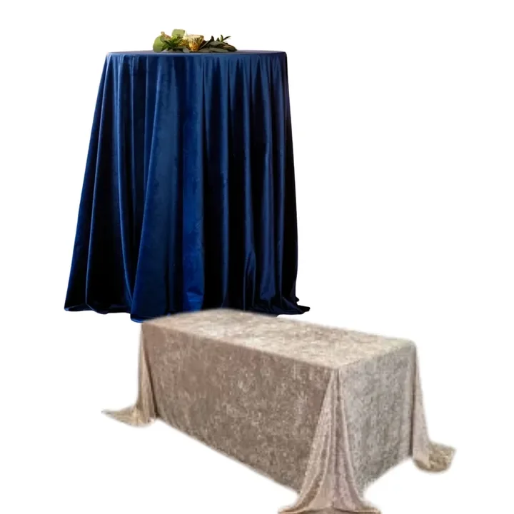 Two covered tables, one with dark blue satin and one with metallic beige fabric, set against a white background.