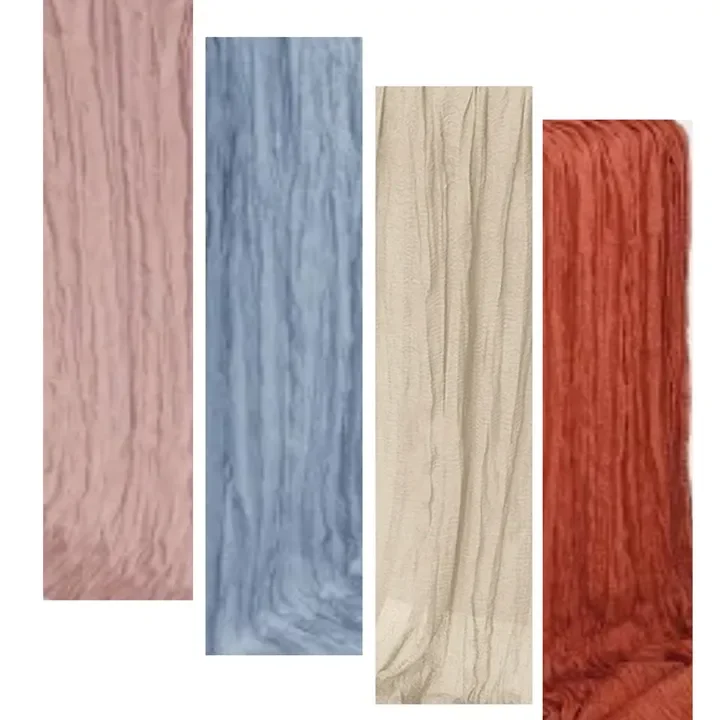 Four wooden planks painted in different colors: pink, blue, beige, and red.