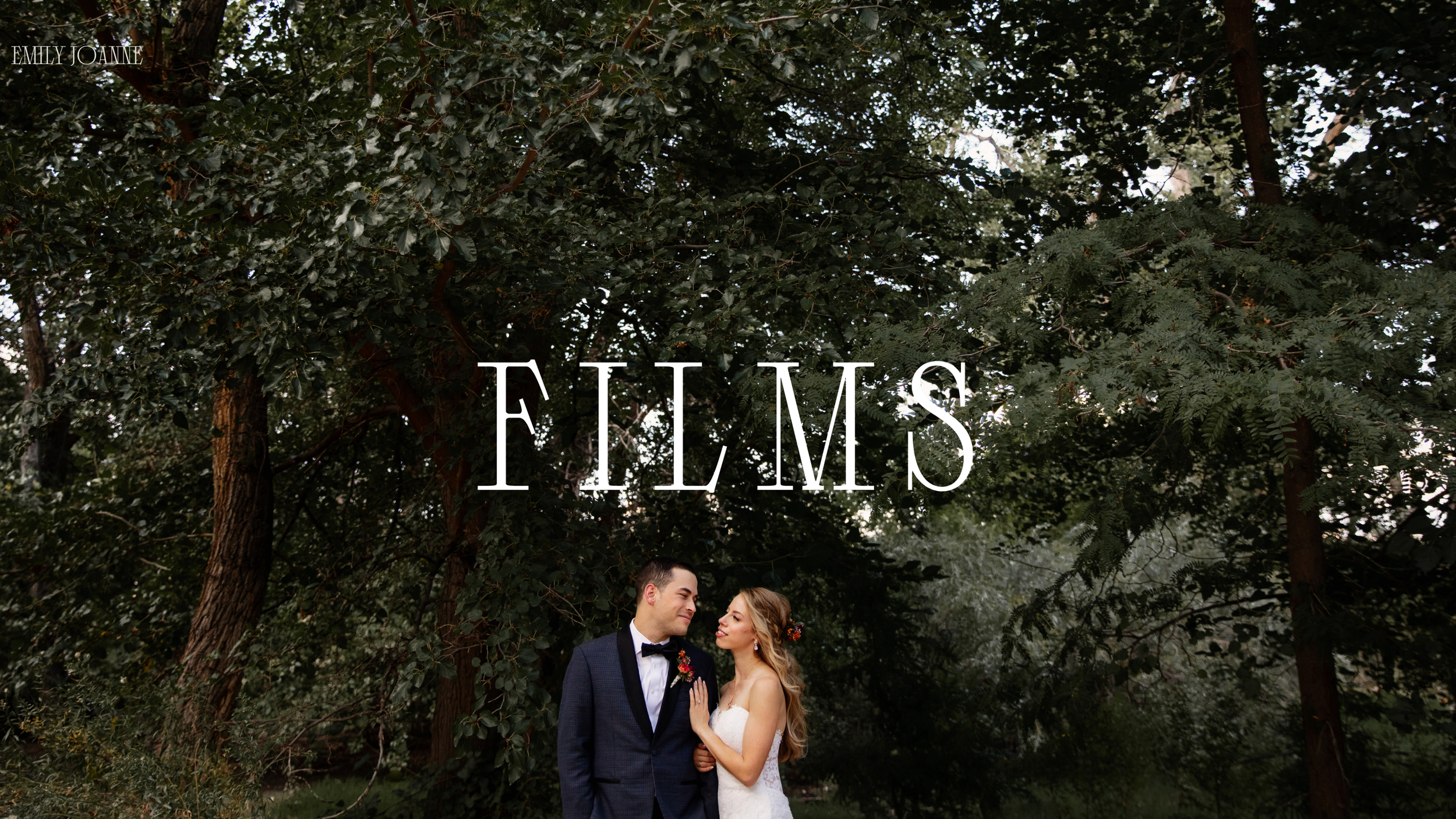 A wedding couple stands close together outdoors beneath large trees, with the woman touching the man's face. The word 'FILMS' is overlaid in large white letters, and 'Emily Joanne' is written in the top left corner.