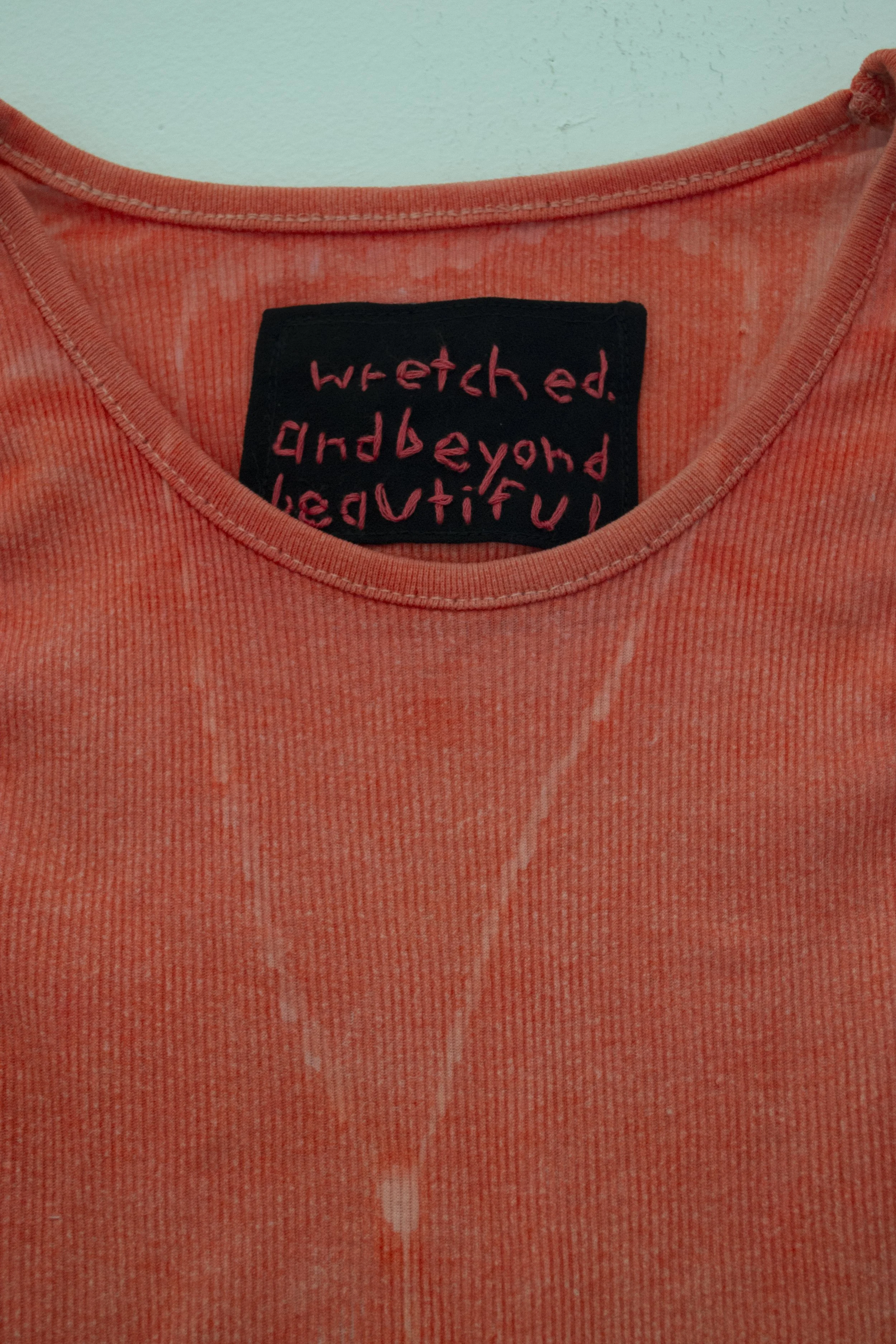 "I Wear Your Anger" 18x10 2025

Solarfast Dye, My Mother's Shirt, My Mother's Rosary, Patch Made From Scraps Of My Mother's Pants, Cotton Embroidery Thread, Grommets, Nails