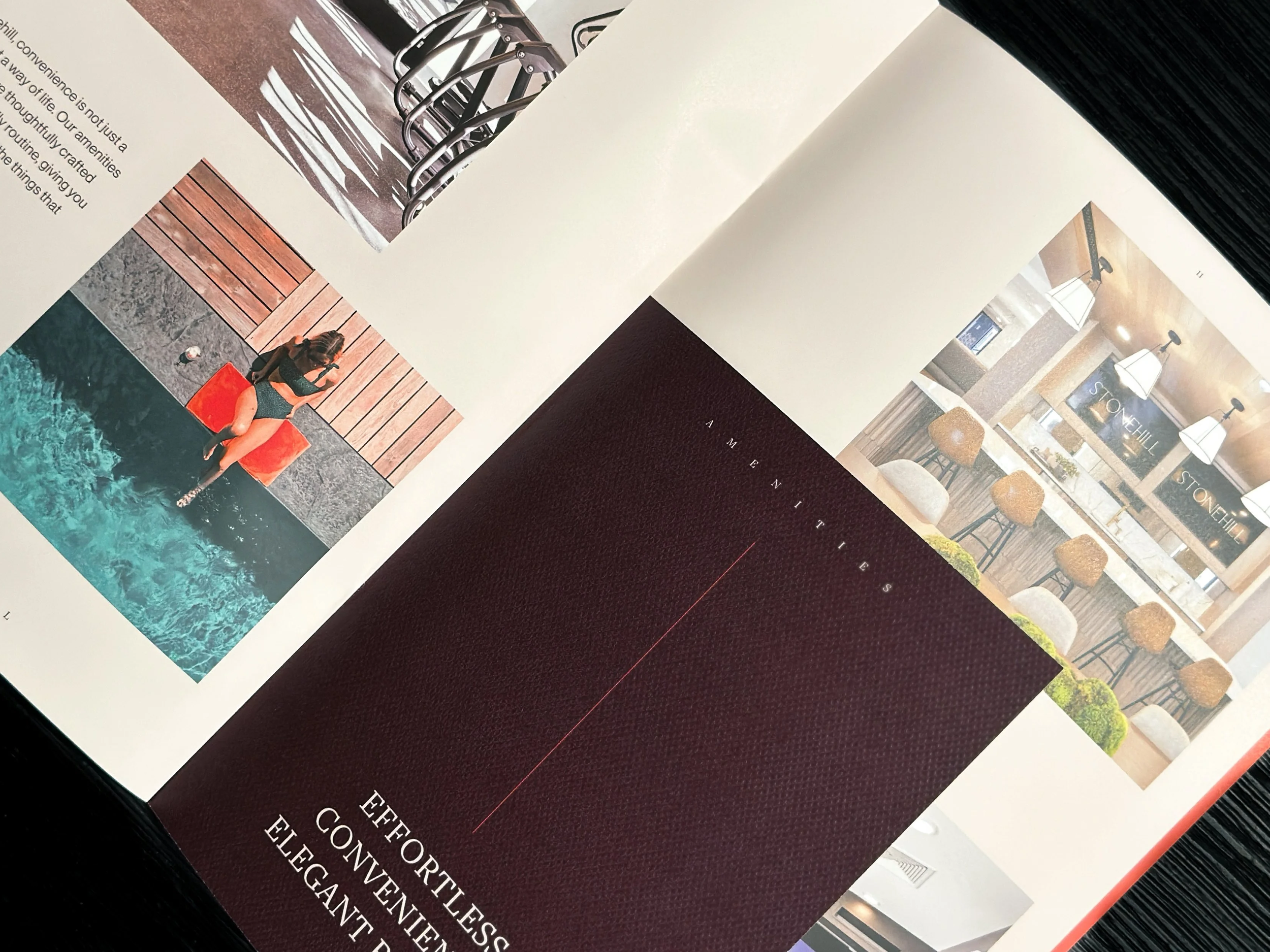 Brochure spread with mini-maroon pages inset in the larger brochure that detail out the amenities.