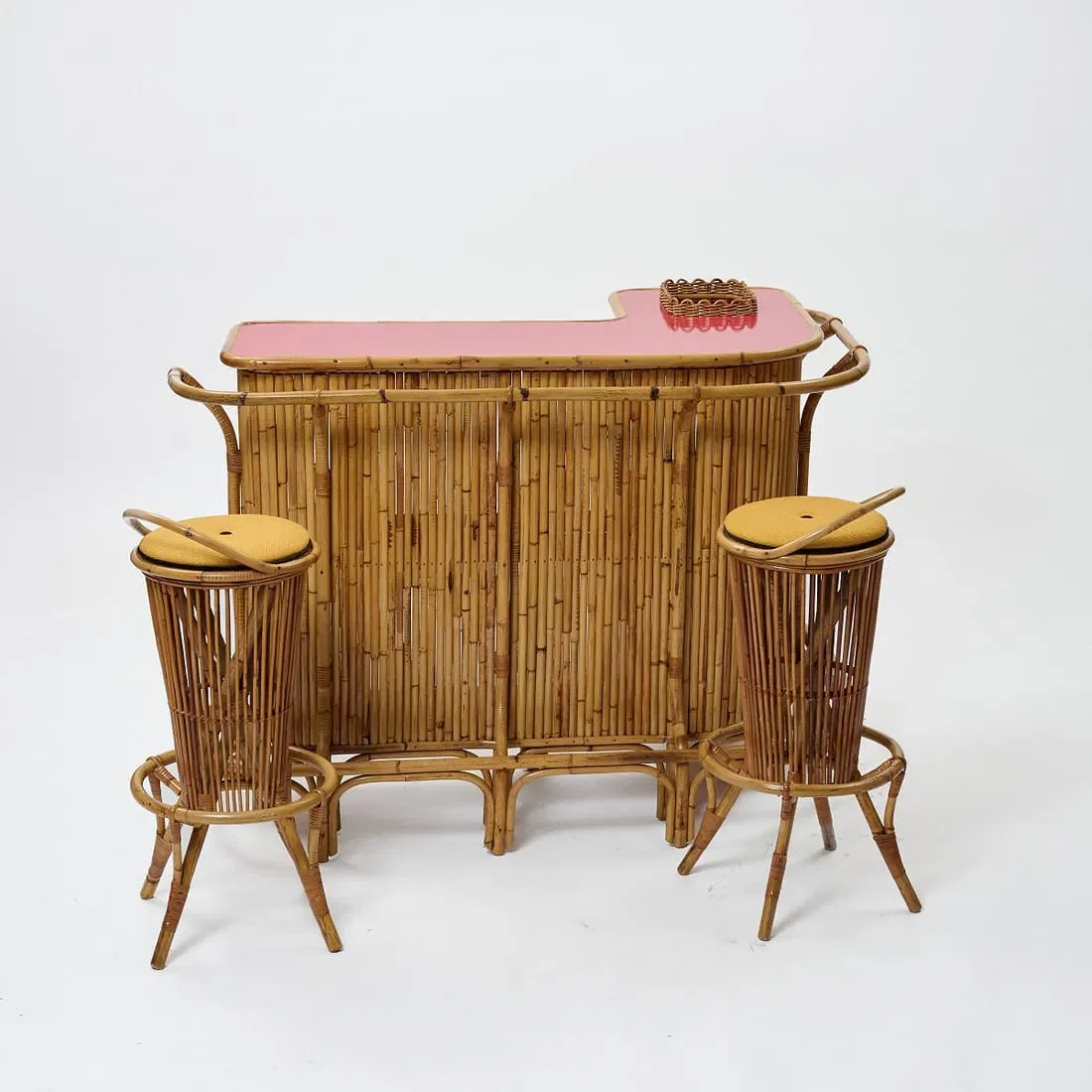  RATTAN BAR 
 STARTING BID €900 
 ESTIMATE: €1.2K–€1.8K 
 COLLECTIP FAVOURITE ↓  