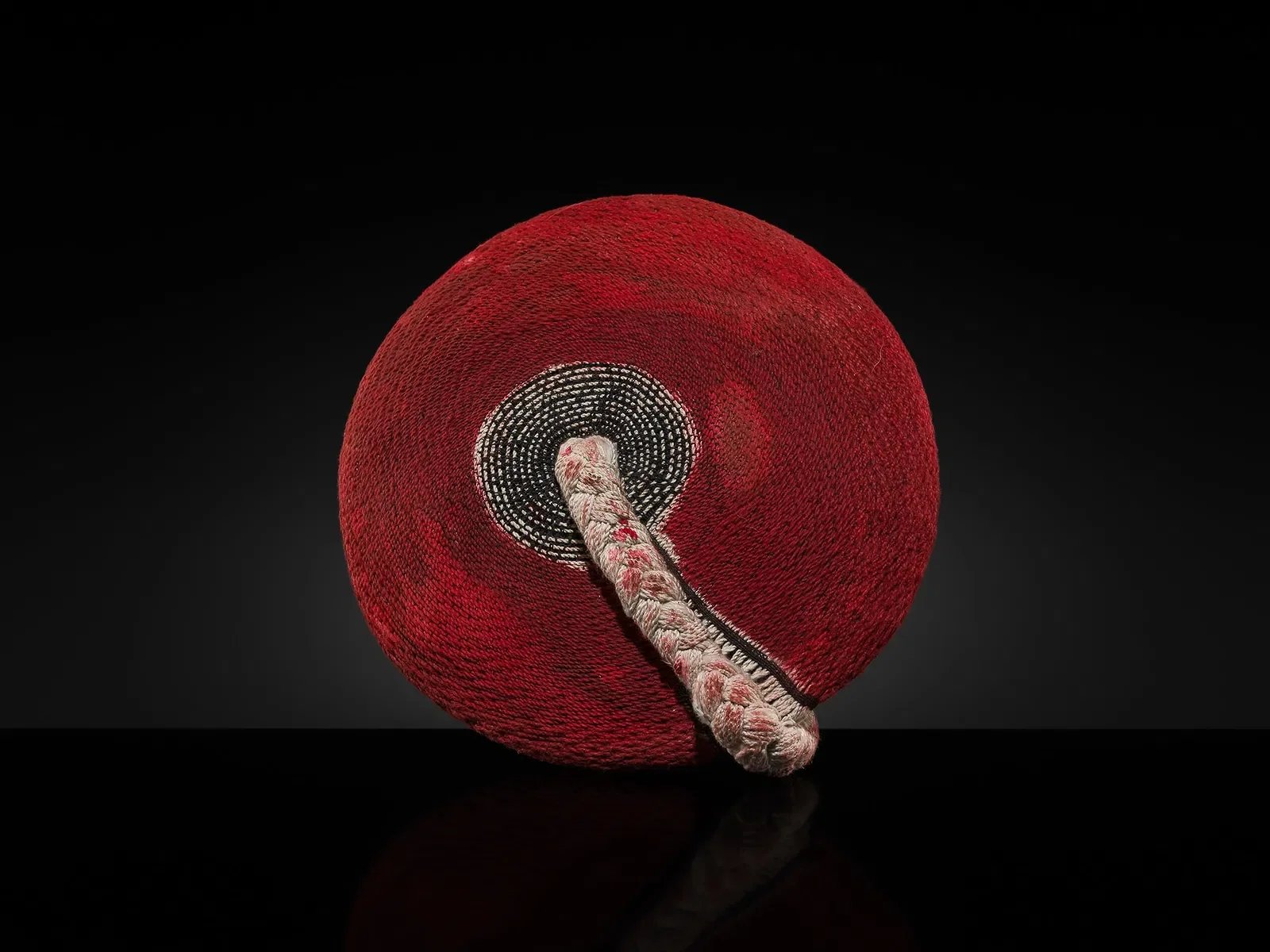  A ZULU DYED FIBER WOMAN'S HAT, ISICHOLO, 20TH CENTURY 
 STARTING BID €400 
 ESTIMATE: €400–€800 
 UNDERVALUED ↓ 