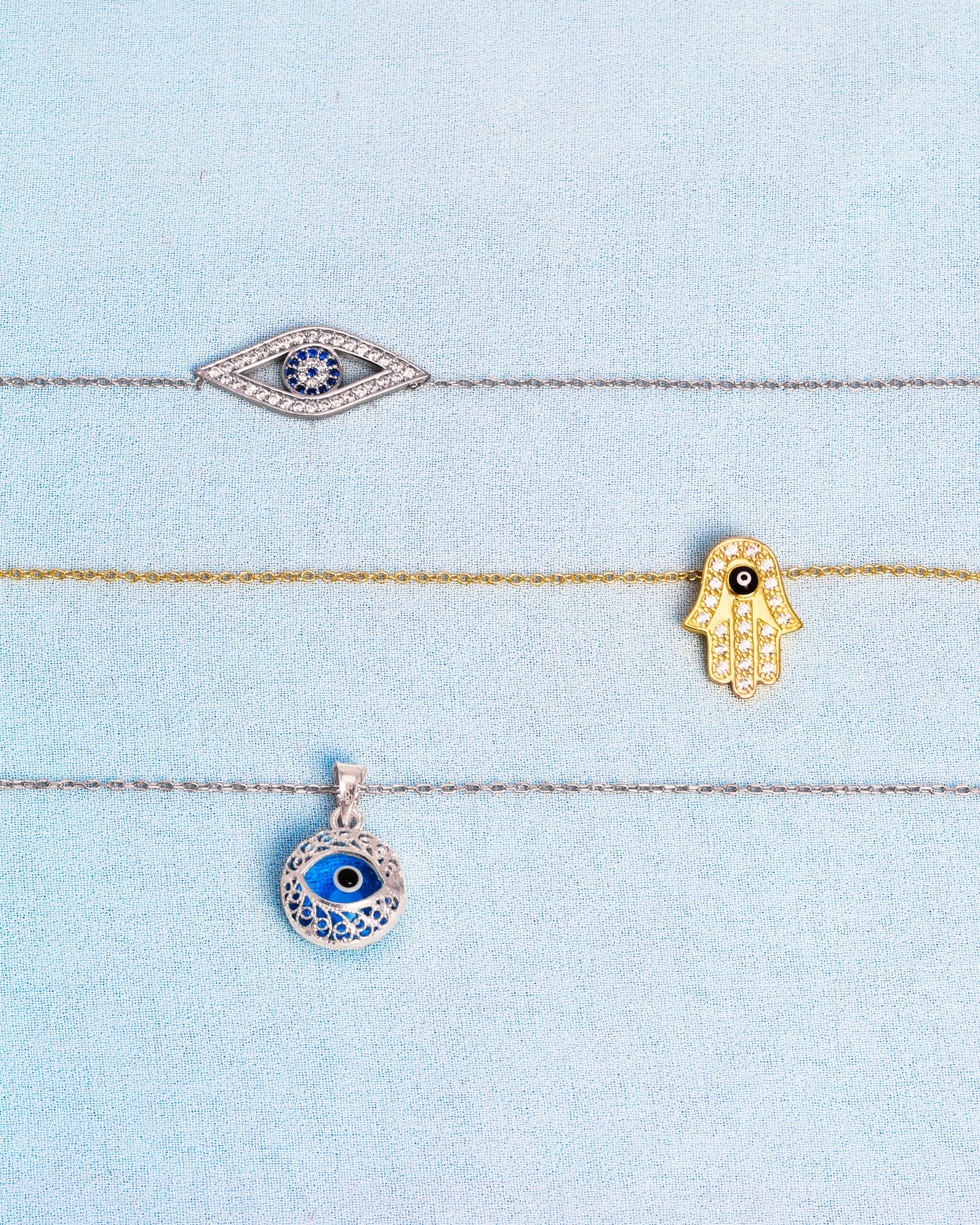evil-eye-pendant-gold-silver-may-2021.jpg