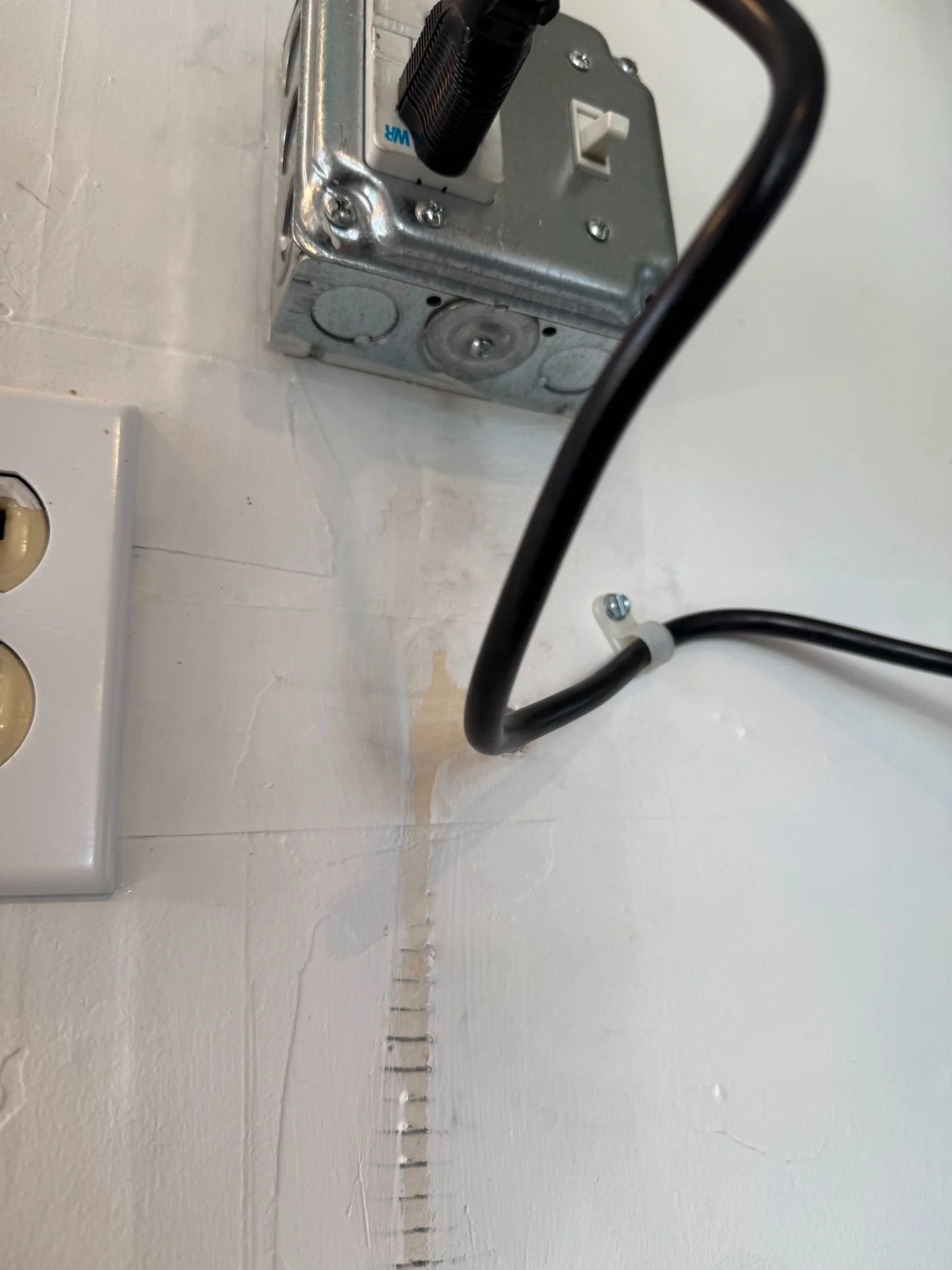 ev-charger-outlet-installation-closeup.jpg