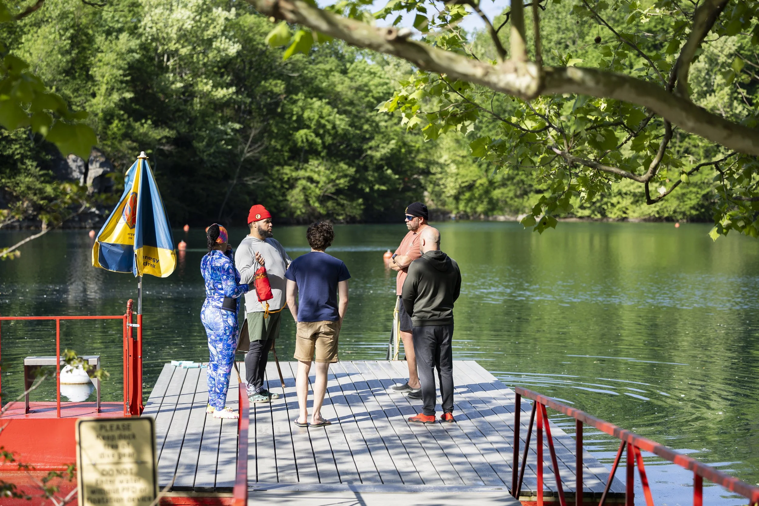 Students and instructors from Louisville dive shop stand together and talk through a dive for an open water class April 25, 2026 at Mermet Springs in Belknap, Illinois.