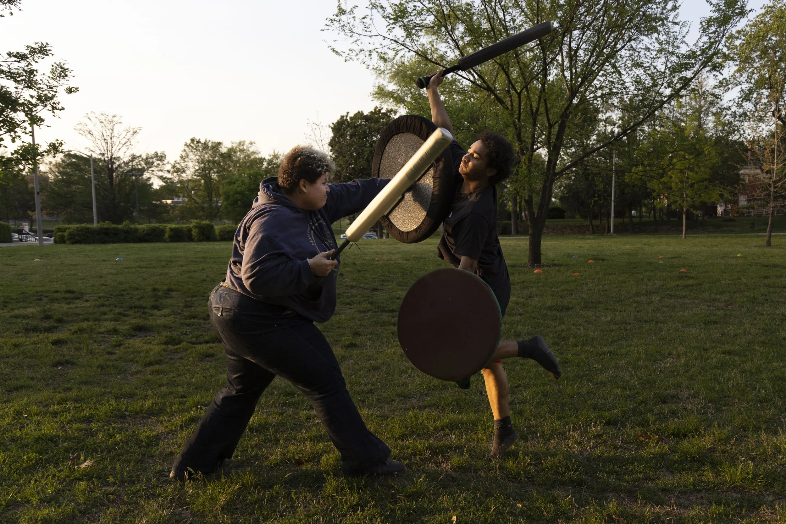 Jasmine Fleming (Skia) prepares to dodge Isaac Ramirez (Omen) at practice April 14, 2026 in front of Morris Library in Carbondale, Illinois. 