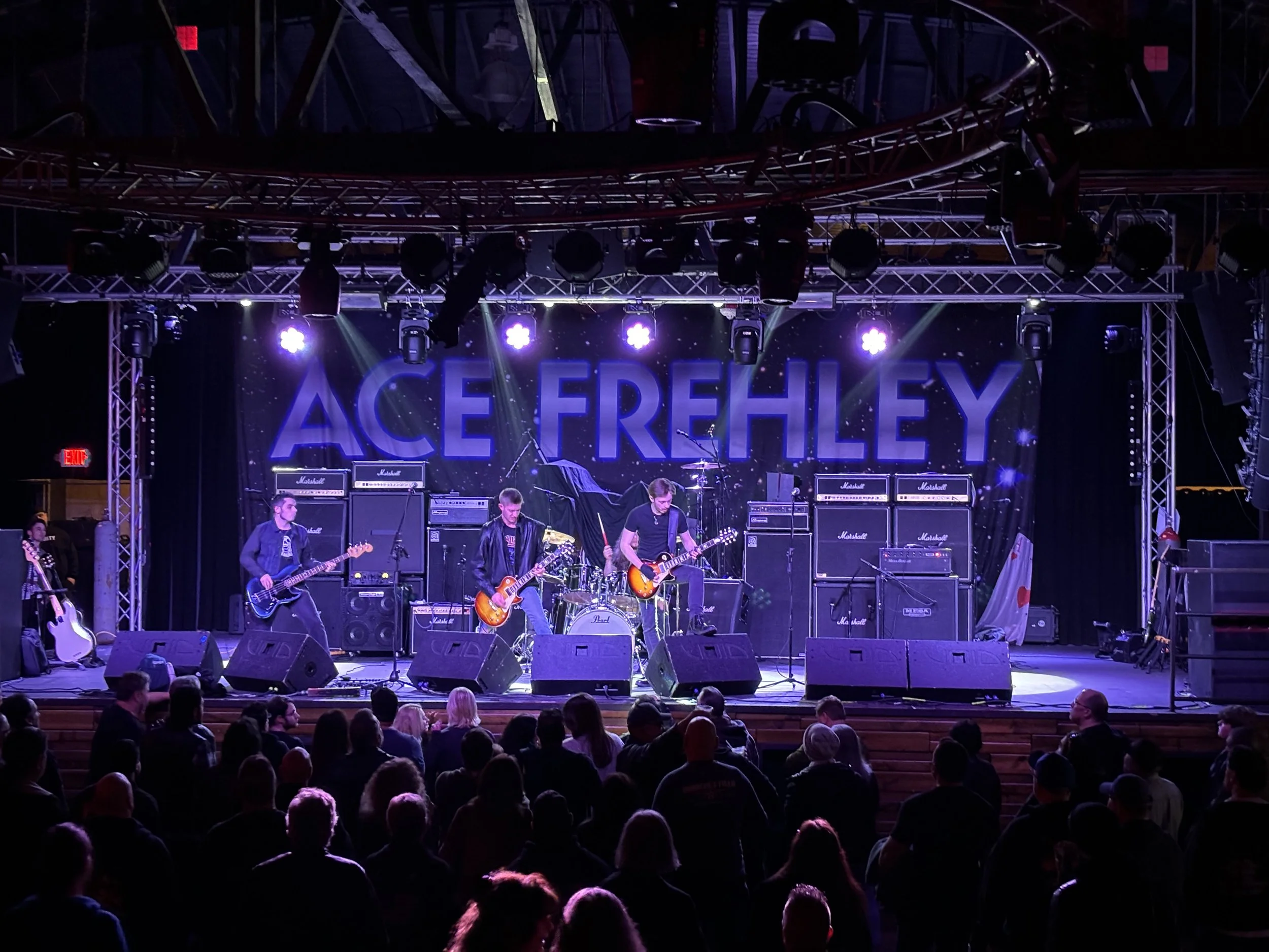 Mainline live at Stereo Garden with Ace Frehley banner on stage.