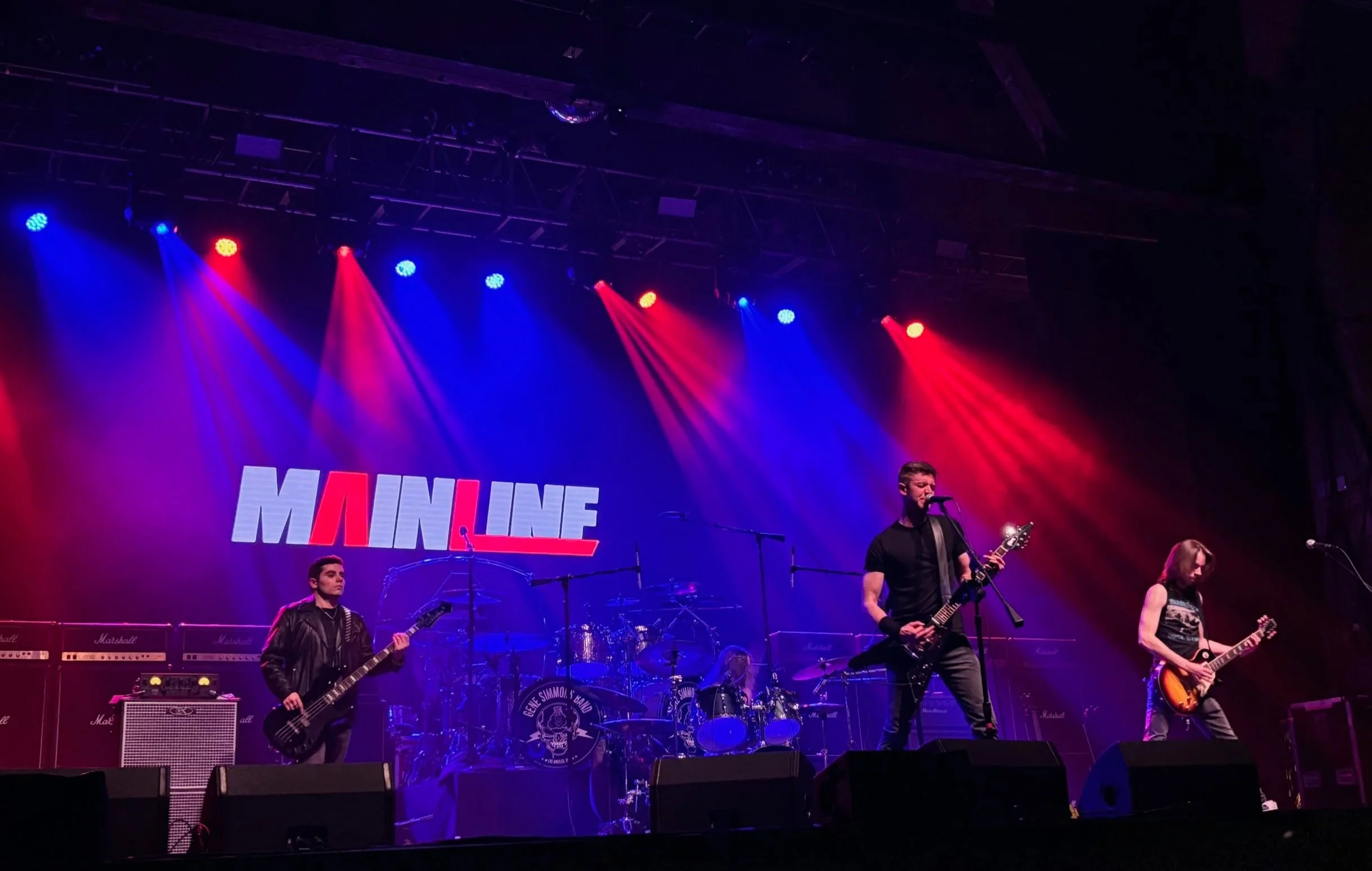 Mainline performing live on stage at The Paramount in Huntington, NY with stage lights