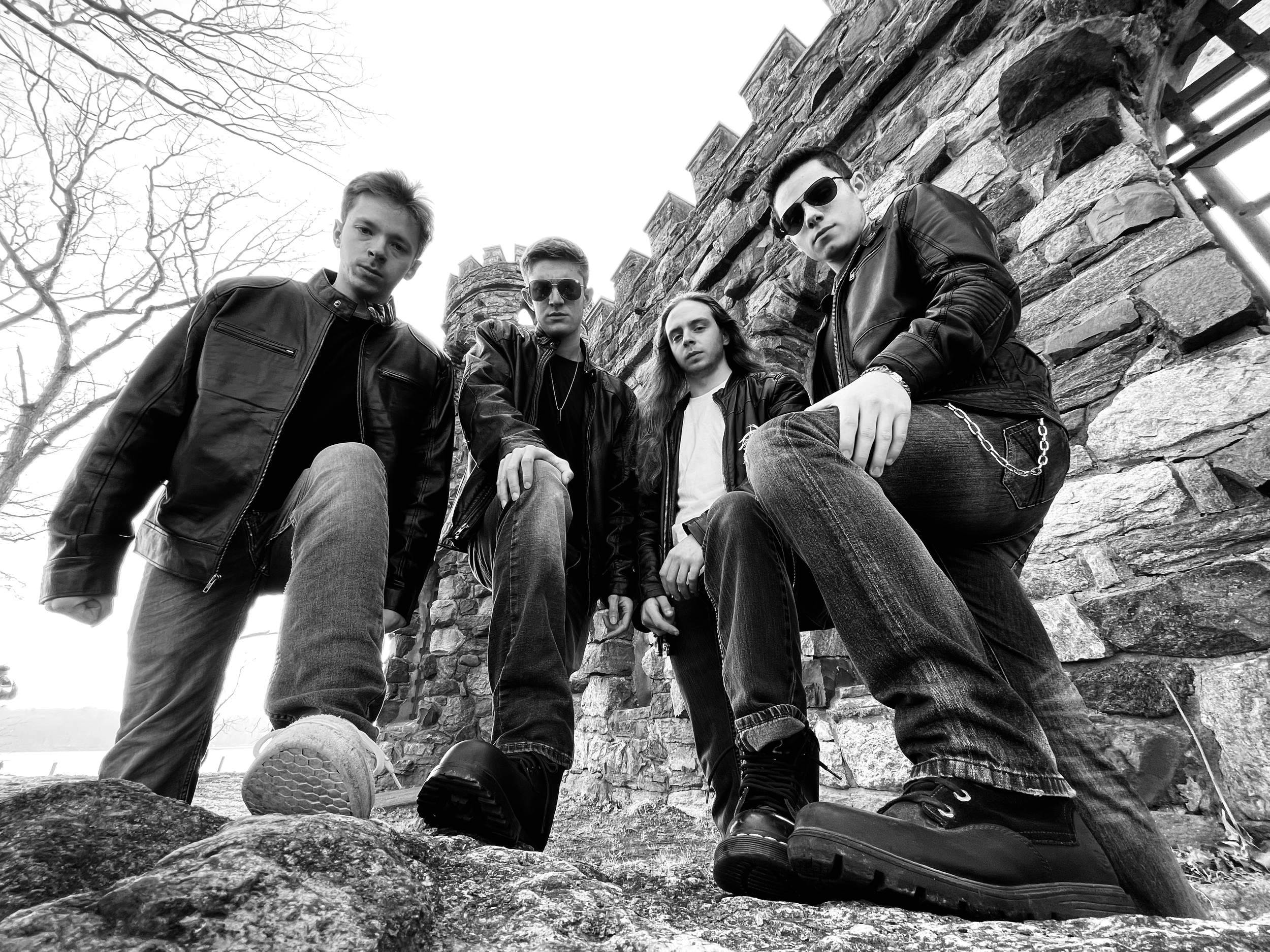 Mainline promo shot outside castle in black and white