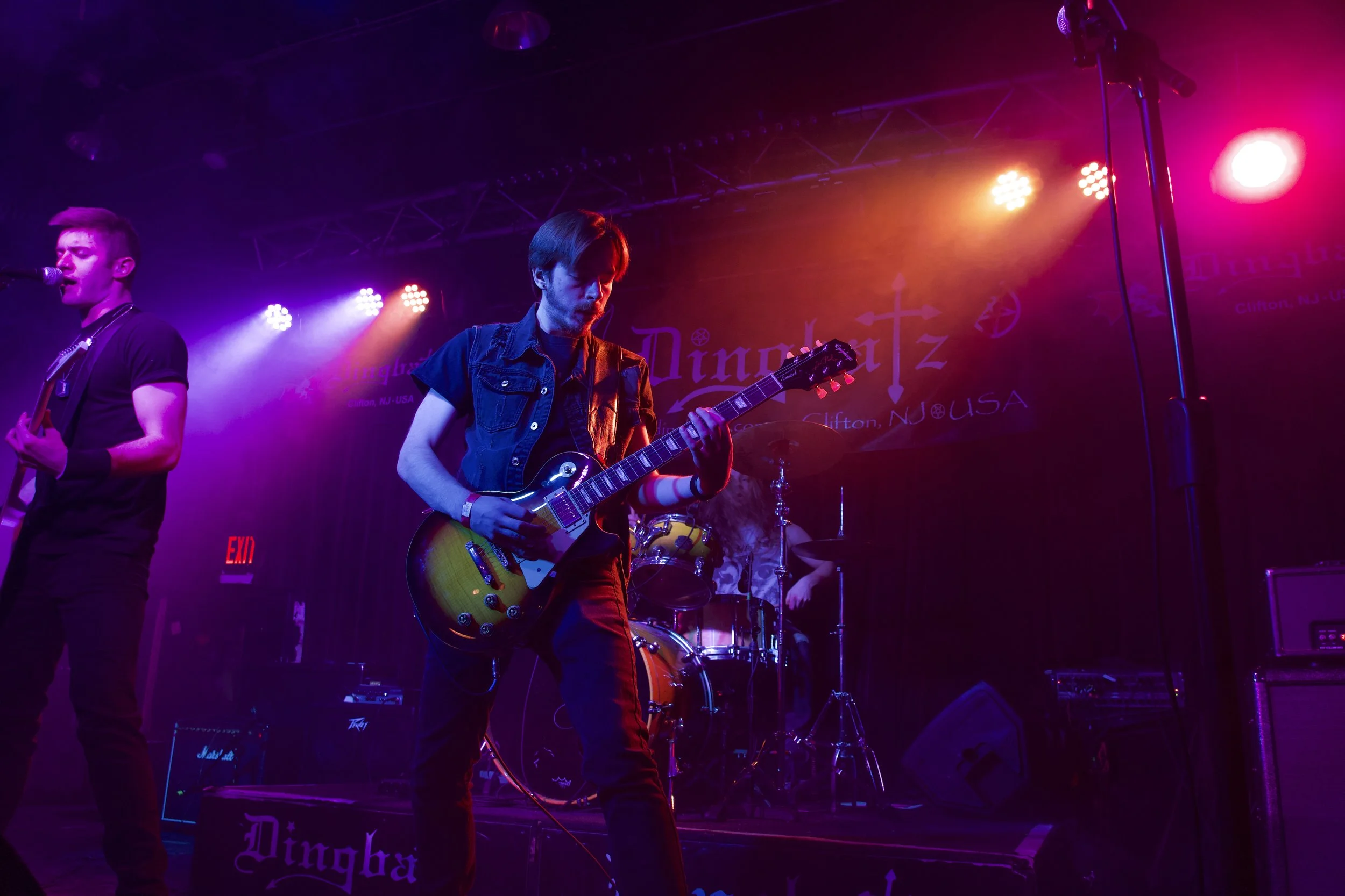 Guitarist Ryan Hartell performing live at Dingbatz