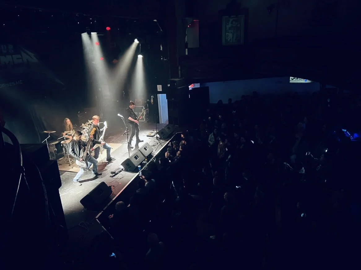 Overhead shot of Mainline performing live at The Chance Theater with crowd.