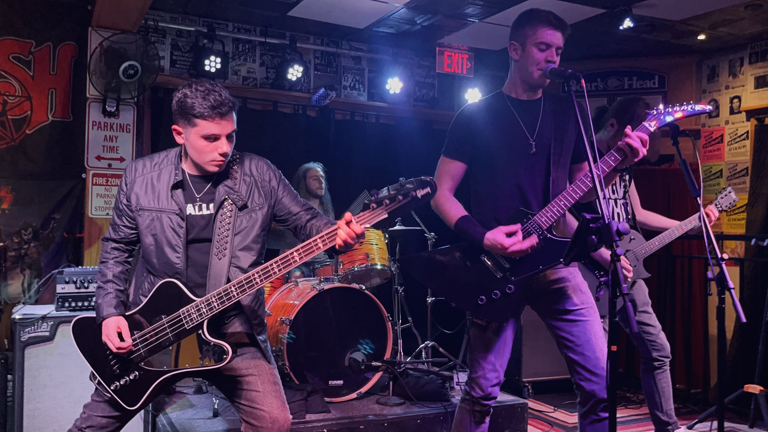 Mainline performing live in an intimate setting.