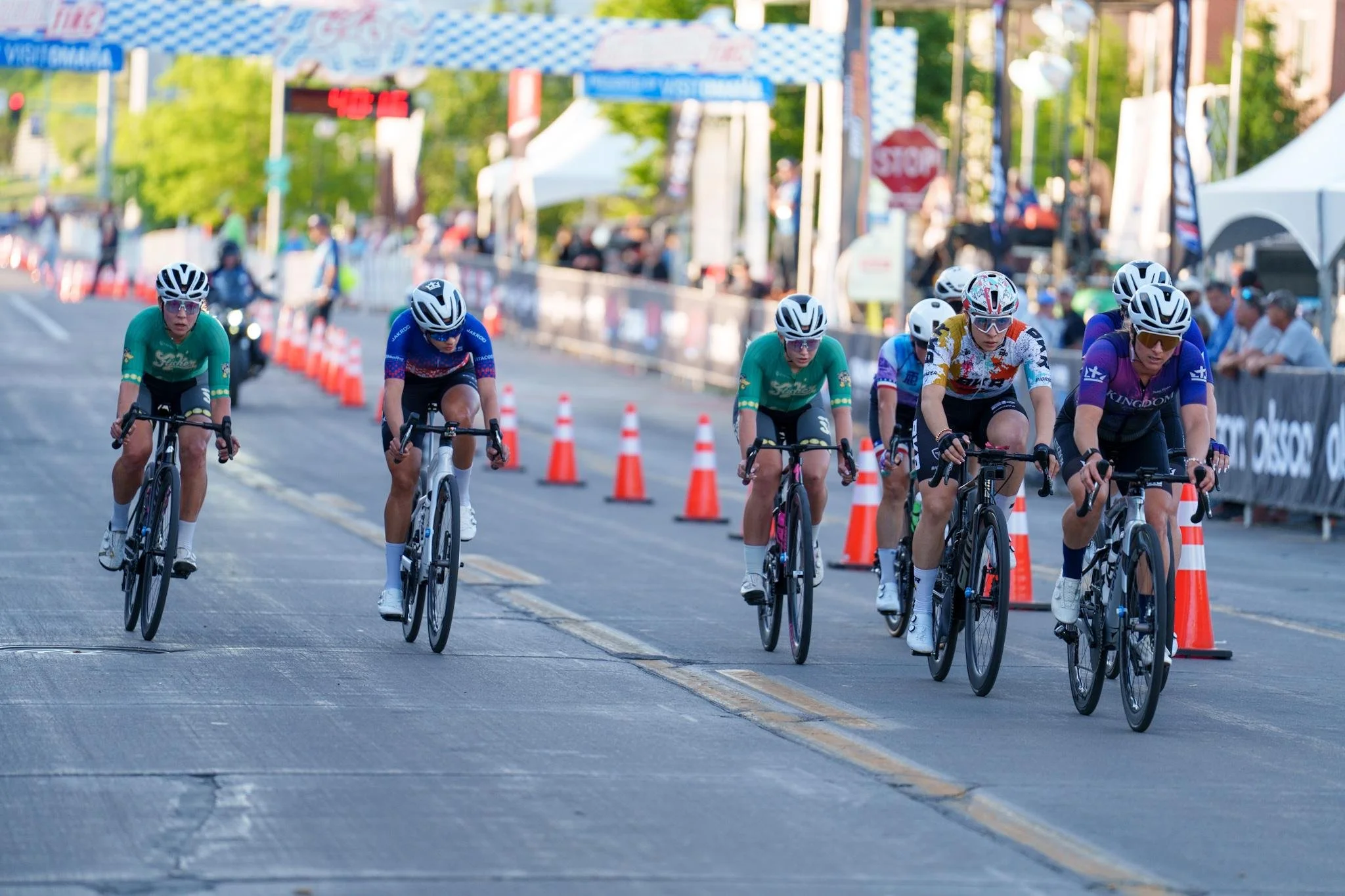 Group of cyclists racing in the Aksarben Tirc Criterium.