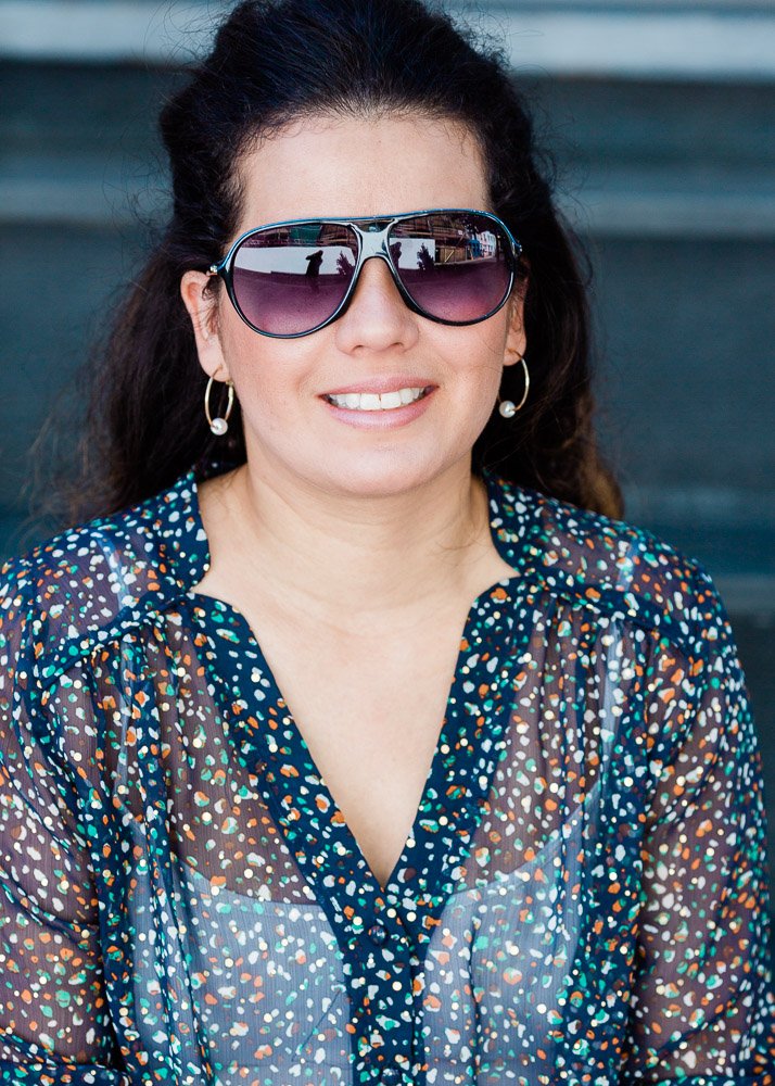 Personal stylist photographed on Notting Hill streets, eclectic creative lifestyle portrait for London fashion stylist personal branding